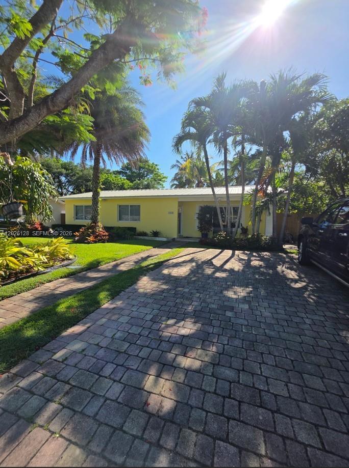 Located in one of Miami’s most desirable neighborhoods, this beautifully maintained 4 BD, 2 BA residence features full impact doors and windows along with a durable metal roof, offering both style and peace of mind. Situated at 8040 SW 63rd Pl, Miami, FL, this approximately 1,800 SF home offers the perfect blend of comfort, charm, and outdoor living on a spacious lot with serene lake views that create a peaceful and private setting.
The property features inviting curb appeal surrounded by mature landscaping and the charm of an established neighborhood. Inside, the home offers a functional layout filled with natural light and comfortable living spaces designed for everyday living and entertaining. The roof was newly installed just one year ago, the plumbing was renovated in 2012, and the septic tank was serviced one year ago.

Step outside to a stunning covered terrace overlooking the sparkling pool and tranquil lake views — the ideal space for relaxing or hosting family and friends year-round. The entire backyard is protected by a full screened enclosure (pool cage/net), allowing you to enjoy the outdoor lifestyle comfortably and privately.
Conveniently located near top-rated schools, parks, shopping, dining, and major highways, this property offers easy access to South Miami, Coral Gables, Dadeland, and Pinecrest. A rare opportunity to own a waterfront home in a highly sought-after Miami location with endless potential and lasting value.