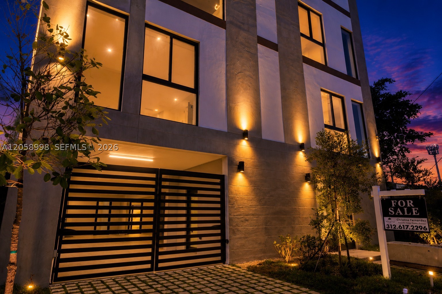 The MiMo 62nd Sky Collection presents two exclusive three-story luxury residences in Miami’s iconic MiMo District. This rare freestanding property offers two side-by-side homes, each featuring a private pool, rooftop terrace, 4 bedrooms, and 4.5 bathrooms—combining the privacy and scale of a single-family home with the sophistication of modern architectural design. The first level is designed for entertaining with dramatic 22-foot ceilings, an expansive lounge, and direct access to a private ground-floor pool. The second level features an open-concept living and dining area anchored by a chef’s kitchen with custom European cabinetry, oversized island, and premium Fisher & Paykel appliances. Floor-to-ceiling windows, soaring ceilings, bespoke finishes, and custom-designed doors create a refined sense of light and scale throughout. The third level showcases a luxurious primary suite with spa-inspired bath, two-person shower, soaking tub, and custom walk-in closet, plus two additional en-suite bedrooms with tailored closet systems. The rooftop terrace offers exceptional outdoor living with endless customization possibilities. A secured entry lobby and private garage provide seamless access to each residence. An exceptional opportunity for investors—own both residences for dual rental income or live in one and lease the other. Residences also available individually at $1.85M.
