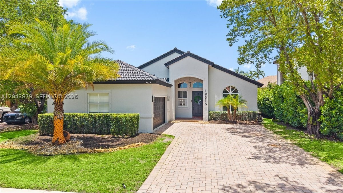 Welcome to one of West Miramar's most sought-after gated communities. This beautifully maintained residence offers an open-concept design with soaring ceilings, abundant natural light, and elegant finishes throughout. The remodeled chef's kitchen is truly the heart of the home, featuring custom cabinetry, designer touches, and an oversized island perfect for gathering and entertaining.

The spacious layout blends comfort and style, creating inviting living spaces ideal for both everyday living and special occasions. Enjoy seamless indoor-outdoor living with a covered patio and lush tropical landscaping, providing the perfect setting to relax or host family and friends year-round.

Conveniently located near top-rated schools, parks, shopping, dining, and major highways, this exceptional home offers the perfect combination of style, comfort, and location.

A true West Miramar gem, ready to welcome its next owner.