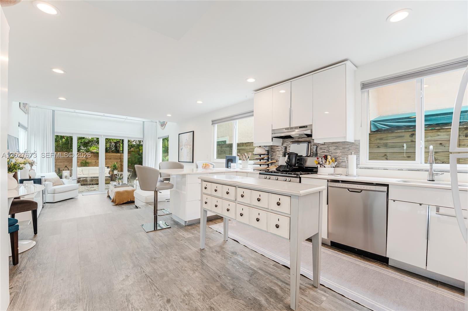 Located within the highly sought-after boundaries of Coconut Grove Elementary School and just a short distance from the school, this beautifully maintained two-story single-family home offers the perfect blend of comfort, style, and location. Featuring 3 bedrooms and 3 bathrooms, this move-in-ready residence has been thoughtfully updated to provide modern convenience while maintaining its warm and inviting character. Located in a no flood zone with impact windows and doors throughout offer peace of mind. The home also includes a new washer and dryer, new a/c, alarm system, and elegant new window treatments. Outside, the property truly shines. A new two-car carport, new outdoor pavers, and a new privacy fence enhance both functionality and curb appeal. The backyard has been transformed into a tranquil Zen-inspired retreat, complete with lush landscaping, and a cozy fire pit area that creates the perfect setting for entertaining guests or enjoying a quiet evening under the stars. Ideally situated within Coconut Grove, and near Coral Gables, with all the parks, restaurants, shopping, and major transportation routes, this exceptional home combines the benefits of a peaceful residential neighborhood with easy access to some of Miami's most desirable destinations. With its extensive upgrades, beautiful outdoor living space, and location within one of Miami's most sought-after school districts, this property presents a rare opportunity to enjoy the very best of south Florida living.