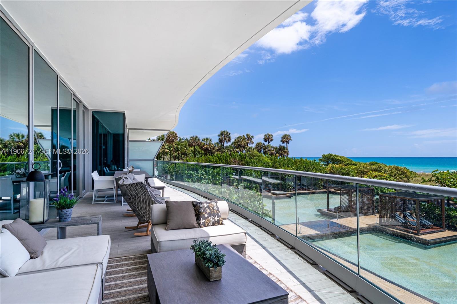 Experience the pinnacle of beachfront luxury at the exclusive FENDI Château Residences. This 4,431SF east-facing residence with expansive terrace captures uninterrupted Atlantic Ocean views from every room—perfectly positioned just above the shoreline for a breathtaking, front-row perspective where waves, sky, and horizon unfold at eye level. Set on a coveted lower floor, this residence offers a rare beach house-like intimacy seldom found in luxury high-rise living—where the sound of the surf, salty ocean breeze, & effortless connection to the shoreline create an immersive coastal experience. Unlike higher floors, the ocean feels close enough to touch, transforming every sunrise into a living work of art. The home features a private art-glass elevator foyer by world-renowned artist Lillian Gorbachinsky, custom artisan flooring, designer lighting, and a 600-lb marine aquarium alive with vibrant coral & exotic fish. All primary bedrooms face the ocean, creating a serene, light-filled retreat. Expansive terraces, a FENDI-designed kitchen, and gallery-style interiors blend sophistication with relaxed oceanfront living. Residents enjoy a full-service beachfront restaurant with an exceptional menu, chef-driven weekly specials, and culinary quality rarely found in luxury condo living—making it easy to enjoy a resort-style lifestyle without ever leaving home. Complemented by a spa, 24/7 valet, & 300 ft of beachfront near Bal Harbour, this is elevated coastal living at its finest.
