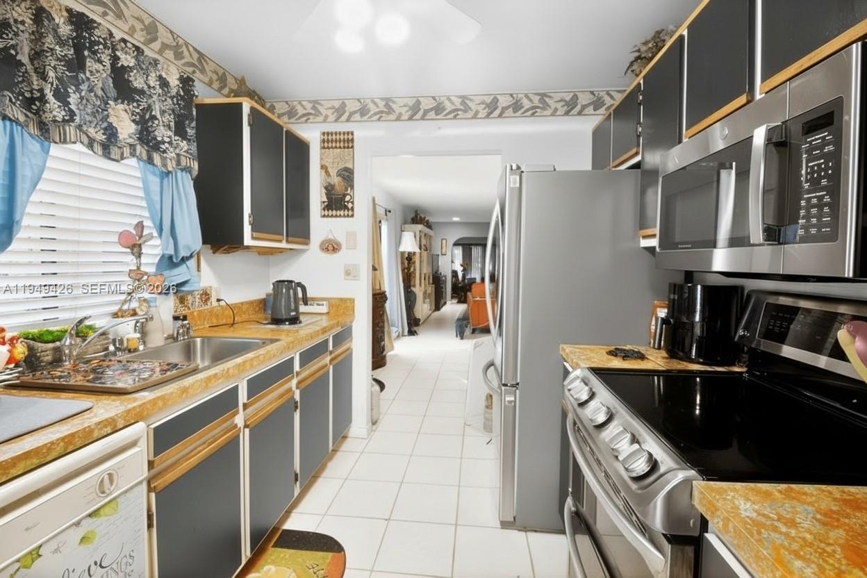 TARTAN COCONUT CREEK PHAS - Residential