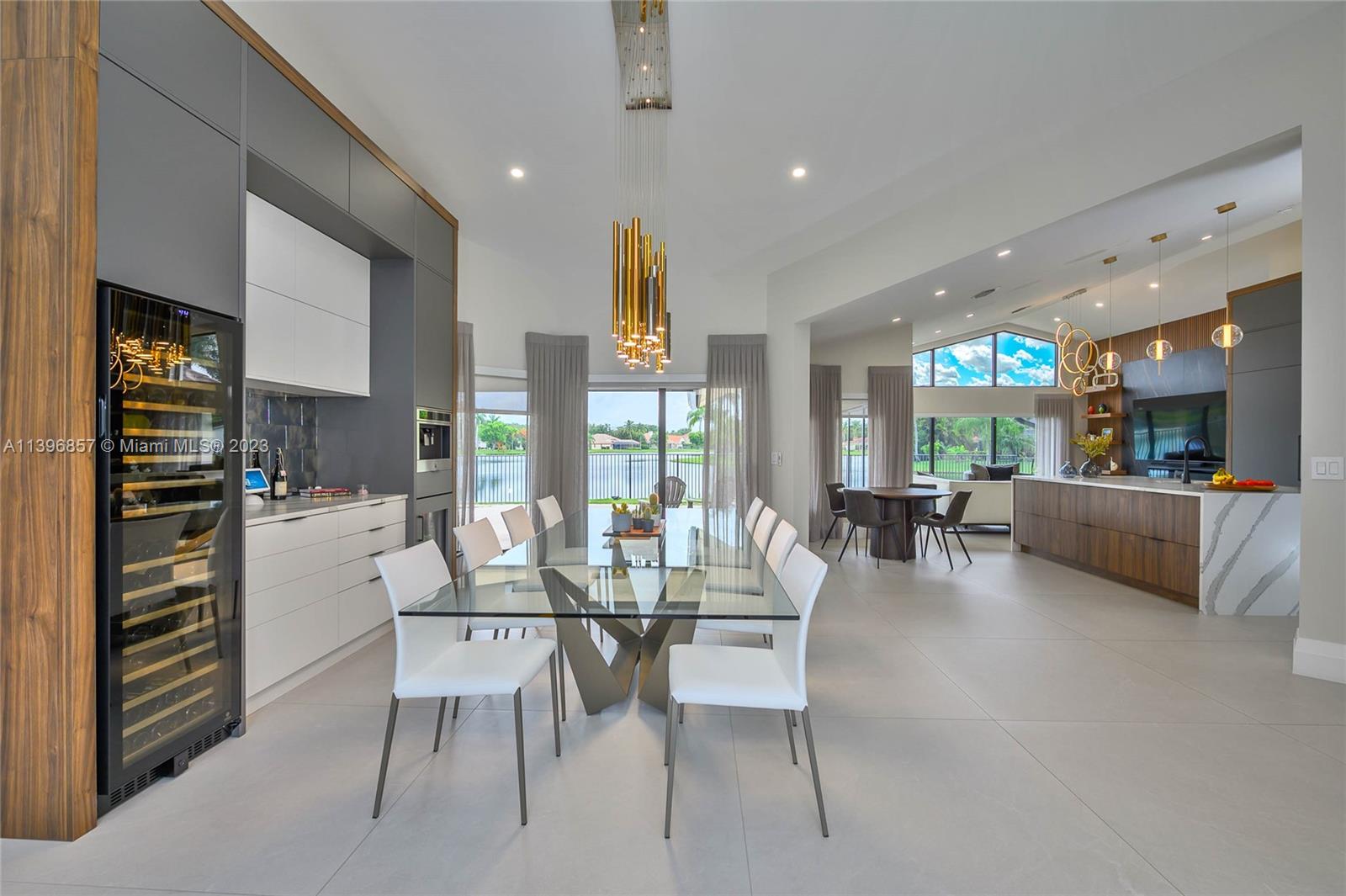 Step foot into this superb home completely redone with the finest of finishing's. Located in the highly sought after neighborhood of Tequesta, this 4/3 + Den - 2 car garage is located on a peaceful cul-de-sac along an oak lined street. Completely open concept and boasting expansive lake views, fully air-conditioned garage. You won't want to miss out on this one!