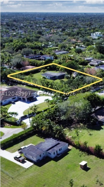 Rare opportunity to own over 1.3 acres in the heart of Miami! Situated on an expansive 56,715 SF agricultural-zoned lot, this unique property offers endless potential to build the custom estate of your dreams. The existing 3-bedroom, 2-bath residence features approximately 2,083 SF of living area and requires substantial renovations or tear down, making it ideal for redevelopment or a complete rebuild. Surrounded by beautiful custom homes, this oversized homesite provides exceptional privacy while remaining just minutes from major highways, top-rated schools, premier shopping, dining, hospitals, and Miami International Airport. Whether you envision a luxury estate, family compound, or private retreat with room for a guest house, pool, gardens, recreational vehicles, or equestrian-inspired amenities, the possibilities are endless. Properties of this size and location are becoming increasingly rare in Miami-Dade County. Don't miss this exceptional opportunity to secure one of the area's most desirable oversized homesites and create a legacy property in a highly sought-after location.