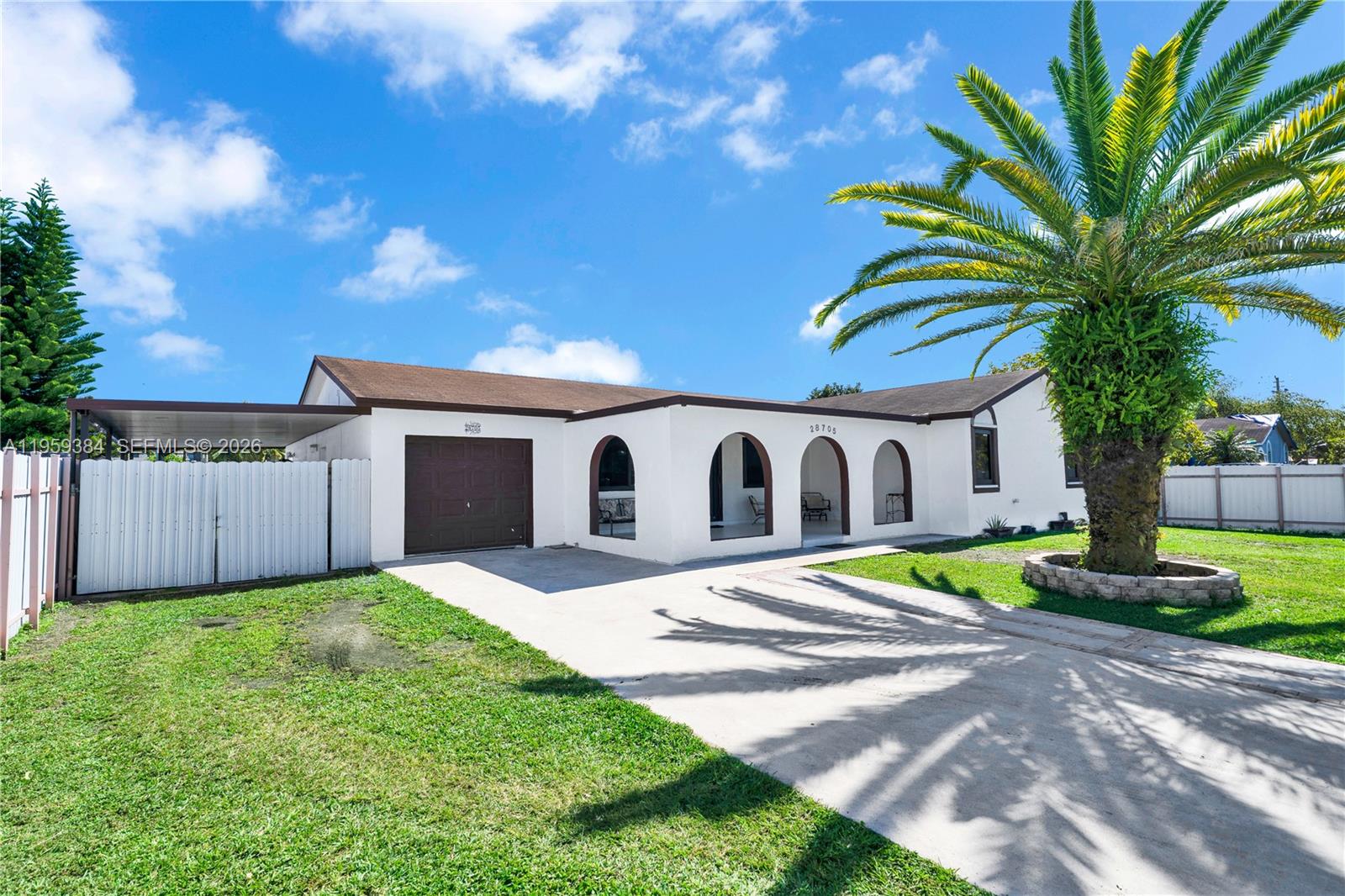 Beautiful and very spacious single-family home for sale in Homestead. This fully remodeled property  offers 4 bedrooms and 2 bathrooms, plus a dedicated home office, ideal for remote work. The home features ceramic tile flooring throughout, impact windows and doors, and solid concrete block construction.
The property has been freshly painted and includes a new water heater, making it truly move-in ready. Enjoy outdoor living with two terraces, including a large covered front porch, perfect for relaxing or entertaining. The home is completely fenced and showcases beautiful landscaping, providing privacy and great curb appeal.
Additional features include a spacious garage and ample parking. Conveniently located near supermarkets, shopping centers, and other points of interest, with easy access to the Florida Turnpike for effortless commuting.