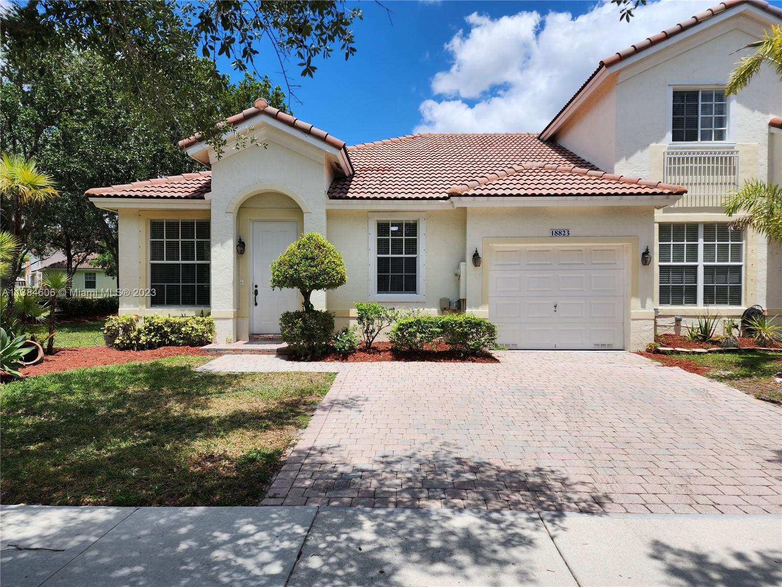 Beautiful 3 bedrooms, 2 bathrooms corner townhouse located in the prestigious community of Grand Key at Sunset Lakes! This cozy 1 story home looks just like a single family. It has a brand-new kitchen, new cabinets and new stainless-steel appliances. New vanities and cabinets in the bathrooms. Beautifully stone decorated wall. Freshly painted. 1 car garage + a driveway that fits 2 more cars. Sunset Lakes Club House features a heated pool, jacuzzi, barbecue area, Game room, Gym, Sauna, Tennis Courts, Volleyball court and more. Several parks and A+ schools in the area.  As per HOA, all 18+ applicants MUST have a minimum Credit Score of 660. HOA includes Lawn maintenance and trash pick-up.