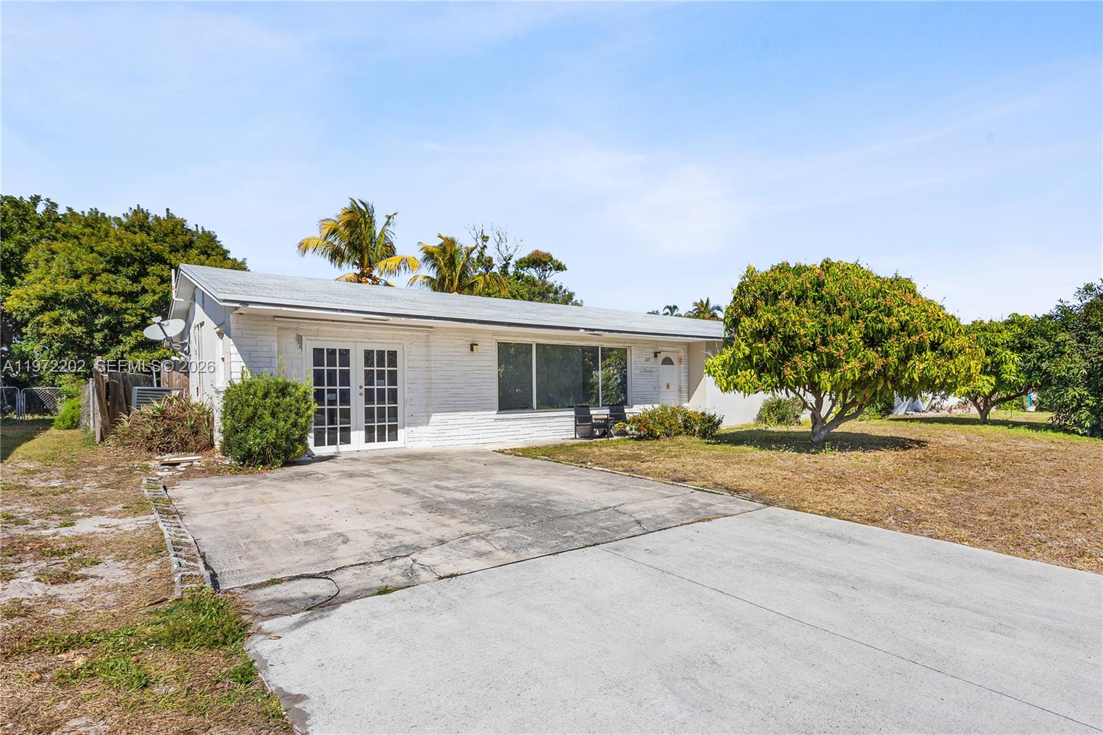 Welcome to Seacrest!! One of the best areas in Boynton Beach!! This MASSIVE house has 5 Bedrooms and 3 full Bathrooms. There are two sets of Jack & Jill bathrooms each opening up to 2bedroom for a total of 4bedrooms and 2 full bathrooms on the east side of the property and one separated master-bedroom and bathroom on the west side of the property. Property also has a large enclosed Florida room. New roof was placed in September 2023. Property has been kept cleaned and maintained. FULL property 3D walk-through video available upon request. Seller is open to selling all the furniture in the property at an extremely discounted rate. PLEASE NOTE - I AM NOT AVILALBE ON THE SABBATH/SATURDAY'S.