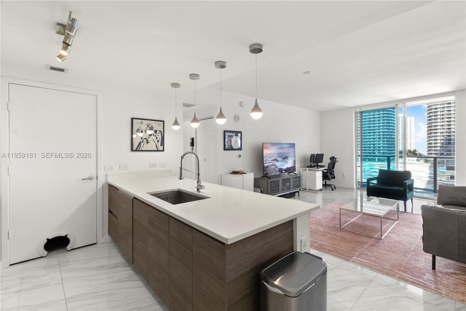 Located at Millecento Residences in the heart of Brickell, this upgraded unit features a custom-built walk-in closet, new porcelain floors throughout including the balcony, a modern kitchen with new backsplash and island, and a spacious bathroom with shower and bathtub combo, making it ideal for both end-users and investors. The full-service, pet-friendly building offers resort-style amenities including two pools, a rooftop pool and lounge on the 43rd floor with stunning Miami views, fitness center, social room, media/theater room, and kids’ playroom, with rentals allowed every 30 days up to three times per year. Walking distance to offices, banks, top restaurants, Brickell City Centre, and Mary Brickell Village, just 20 minutes from Miami International Airport, with association fees covering water, sewer, basic internet, basic cable with HBO, and one complimentary valet parking space included.