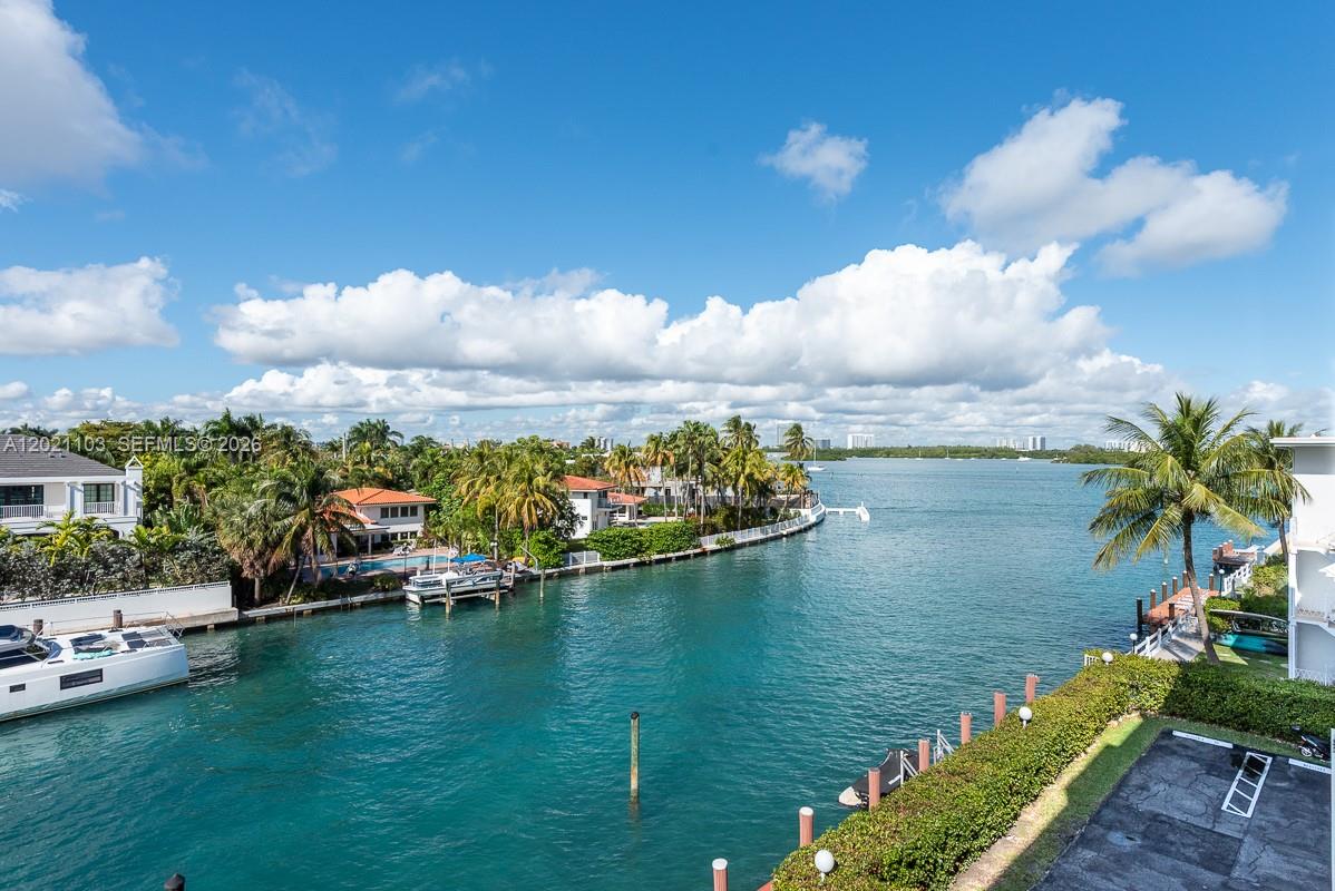Bay Harbor Islands Best... Look no further Your waterfront oasis awaits! Beautifully redone with attention to every detail. This beautiful 2/2.5 SW corner residence with 2045 SF is flooded with tons of natural light. Open eat-in kitchen with rich walnut floors, formal dining, living room & carved out office space all overlooking the waterway. Expansive Primary Bedroom features 2 walk-in closets & gorgeous bathroom with 2 sinks & steam shower. The Oversized 2nd bedroom has 3 closets and an en-suite bath with Jacuzzi tub. There is also a powder room plus laundry/storage with washer and dryer inside the unit. Extra designated storage outside the unit. New hurricane windows/doors, 2 assigned parking spots (1 is covered). Currently in the process of installing new white oak floors in kitchen & bedrooms, new baseboards throughout and fresh white paint for a brand new feel. Bldg completed 50 year certification. Dock space available. Bay Harbor Islands is the cutest town with everything in proximity, Bal Harbour Shops, Surfside, beach, restaurants, houses of worship.