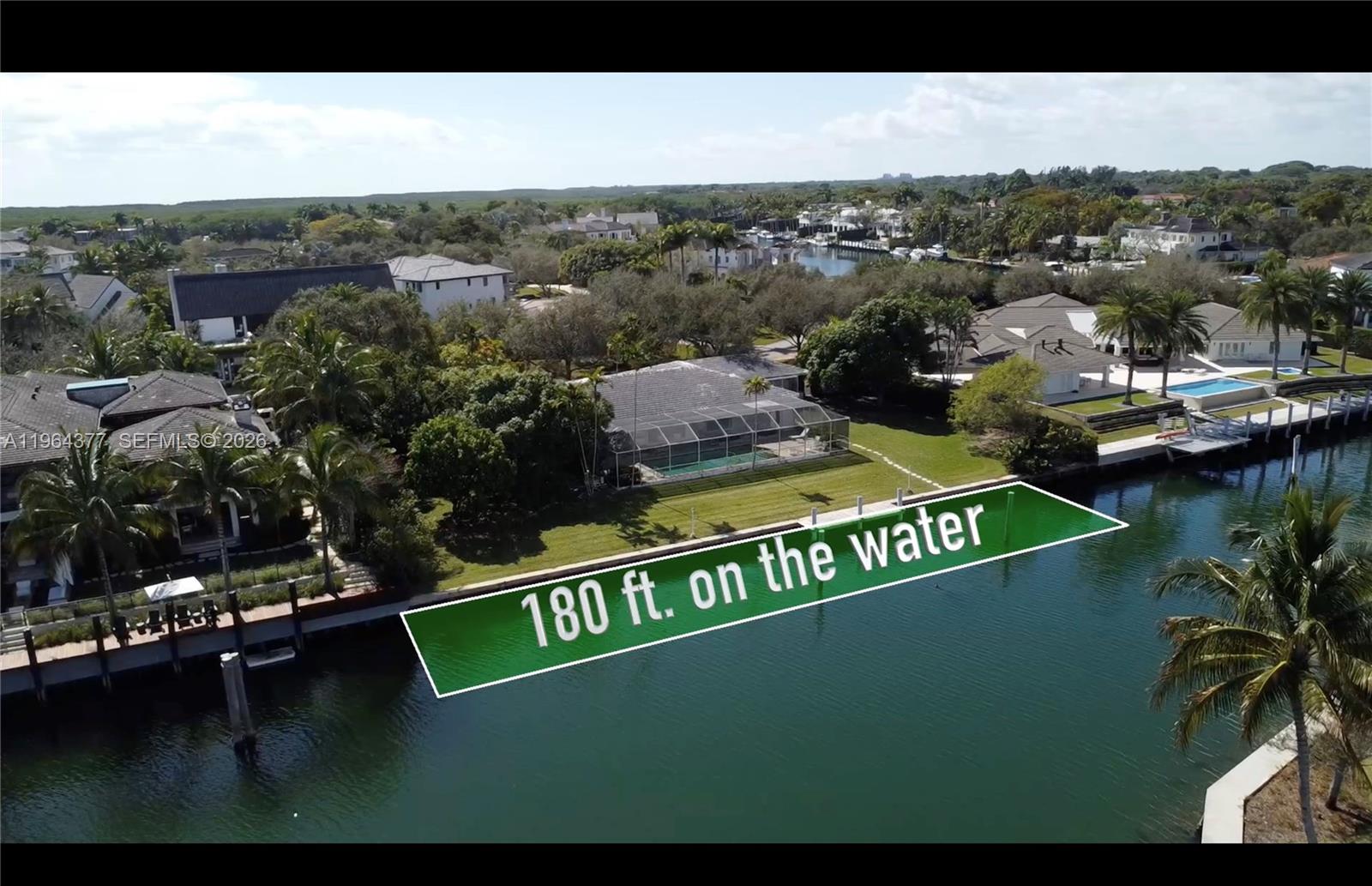 180 feet on the water with wide water views of the Gables Estates/Old Cutler Bay lagoon.  Opportunity to acquire over 1/2 an acre in Old Cutler Bay (one of Miami's most coveted and secure gated waterfront communities).
Rare combination of wide water views and protection for large yachts over 100 feet. No bridges to bay.  Quiet street.  Update the existing home or create a brand new masterpiece on this blank canvas.  (Next to a home listed for $47 million and views of a home listed for $175 million).