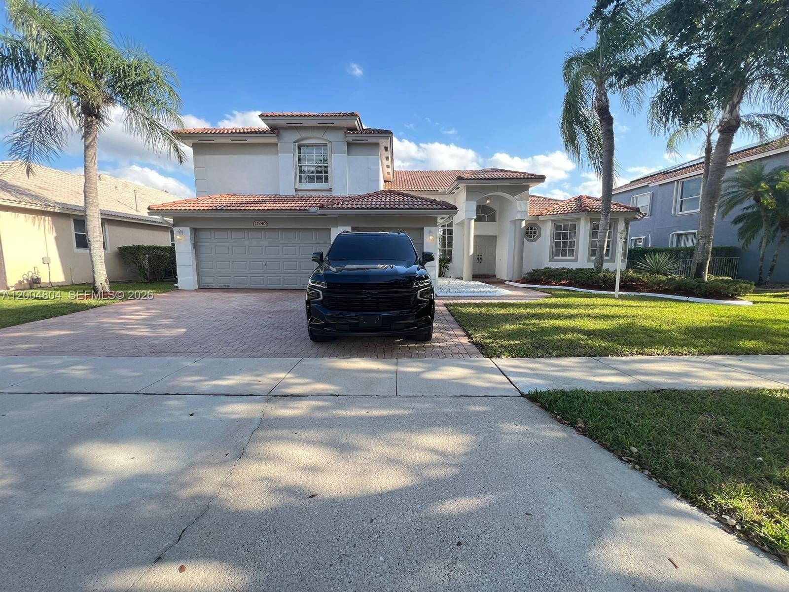 Beautiful 5-Bedroom and 4-bath lakefront residence located in sought-after gated community of Pembroke Falls.  This Spacious two-story Captiva model with an open and elegant floor plan. Centrally located in the heart of Pembroke Pines.   
The main living areas feature upgraded porcelain flooring, volume ceilings, and abundant natural light. The oversized kitchen includes granite countertops, ample cabinetry, and a breakfast area that flows seamlessly into the family room. French doors open to an extended covered patio overlooking spectacular panoramic lake views—perfect for relaxing or hosting guests.  

The home offers a generous primary suite with tray ceilings and wood flooring, along with spacious secondary bedrooms and a flexible den/office ideal for working from home or guest space. Additional highlights include a renovated cabana bath, accordion shutters, and a three-car garage.  

Situated on a premium waterfront lot in a resort-style community with clubhouse, fitness center, pool, tennis courts, and 24-hour gated security. HOA includes cable and high-speed internet for added convenience.  

Conveniently close to Pembroke Gardens Mall, C. B Smith Park Highways, Hospitals and Highways. 

Enjoy the perfect blend of privacy, space, and lifestyle in one of Pembroke Pines’ most desirable neighborhoods.