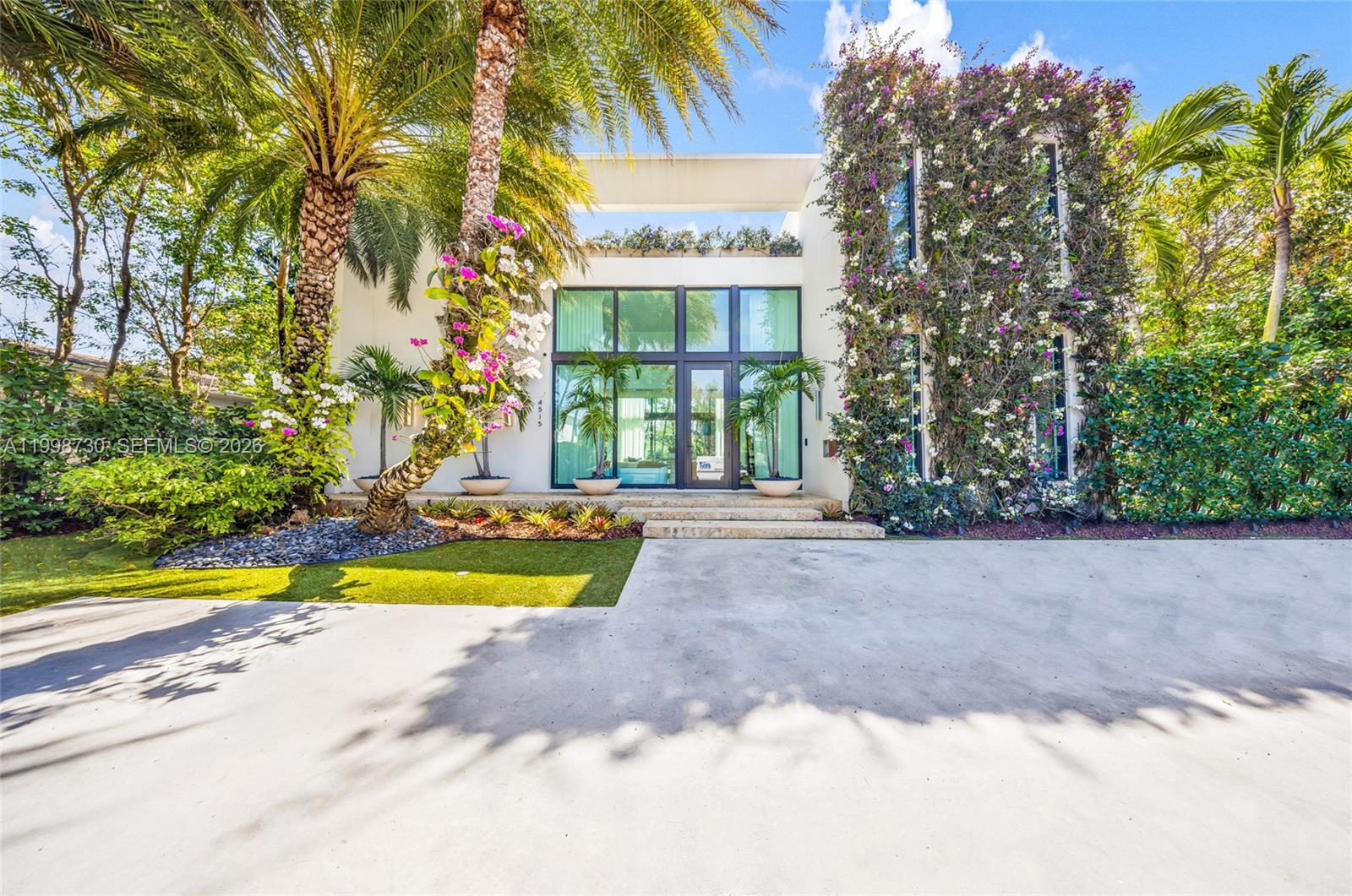 Welcome to 4515 N Michigan — a beautifully maintained and architecturally distinctive residence designed by Choeff Levy Architecture, offering comfort, space, and versatility in a prime Miami Beach location. This exceptional 4-bedroom, 4.5-bath modern pool home boasts 3,994 square feet of interior living space, featuring a thoughtfully designed layout with generous living areas, abundant natural light, and well-proportioned bedrooms that provide both functionality and relaxation. Designed with privacy in mind, the home offers a serene and secluded atmosphere while still being at the center of it all.

The sleek, modern kitchen is outfitted with premium gas Viking appliances, ample space perfect for entertaining. Additional highlights include refined finishes, open-concept living spaces, and a seamless indoor-outdoor flow enhanced by the home’s light-filled design.

Step outside to your private backyard oasis surrounded by gorgeous, lush landscaping, complete with a Large wrap around pool, outdoor bar and grill, and plenty of space for entertaining or unwinding. A separate detached storage structure adds convenience and flexibility.
Ideally situated in one of Miami Beach’s most sought-after neighborhoods, this home is just moments from world-renowned restaurants, upscale shopping, and vibrant local attractions, offering the perfect blend of luxury, convenience, and lifestyle. Call Listing Agent for details and Showings.