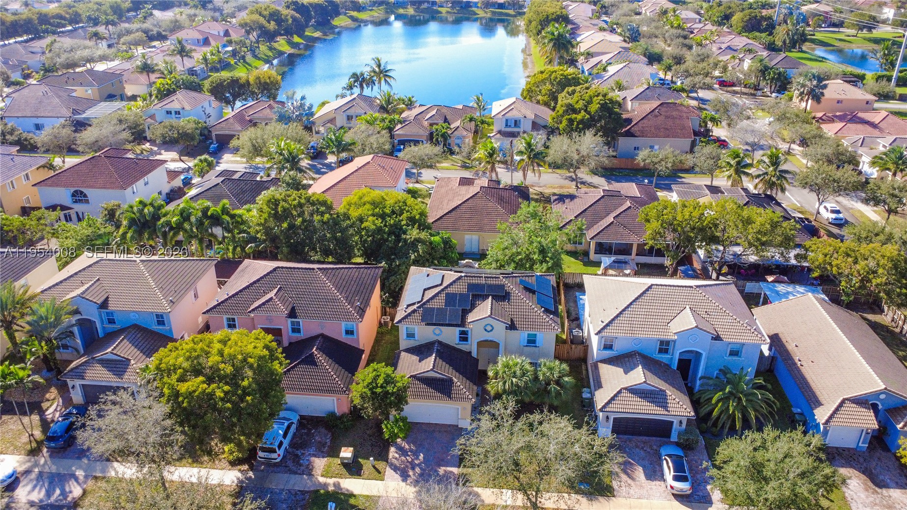 MOTIVATED SELLER!! Two-story home in Keys Landing featuring 4 bedrooms and 3 full baths, including a desirable ground-level suite—ideal for multigenerational living, guests, or added privacy. The open-concept layout offers spacious living areas and a modern kitchen equipped with stainless steel appliances and a wet bar, perfect for entertaining. The private primary suite features dual walk-in closets, a soaking tub, and separate shower. Situated on a 5,971 Sq.Ft. lot with room for a pool, this home is also a perfect fit for retirees or as a second home getaway in South Florida. 

Enjoy energy efficiency with paid-off solar panels keeping electric costs low (approximately $75/month). Additional features include impact windows upstairs, storm panels downstairs, a 2-car garage, and dedicated laundry room. HOA includes internet and cable. Conveniently located near parks, schools, shopping, dining, and the Turnpike. FHA and VA approved!