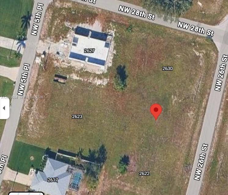Build your dream home in one of Cape Coral’s fast-growing areas! This oversized 0.23-acre (10,000+ sq ft) residential lot offers an excellent opportunity for builders, investors, or future homeowners. Surrounded by newer construction homes and ongoing development, this property is ideally located in a rapidly expanding neighborhood with strong growth potential. Plenty of space to design and build the perfect custom home while enjoying all that Cape Coral has to offer. Don’t miss your chance to invest in an area experiencing continued new construction and development. Call listing agent for more info.