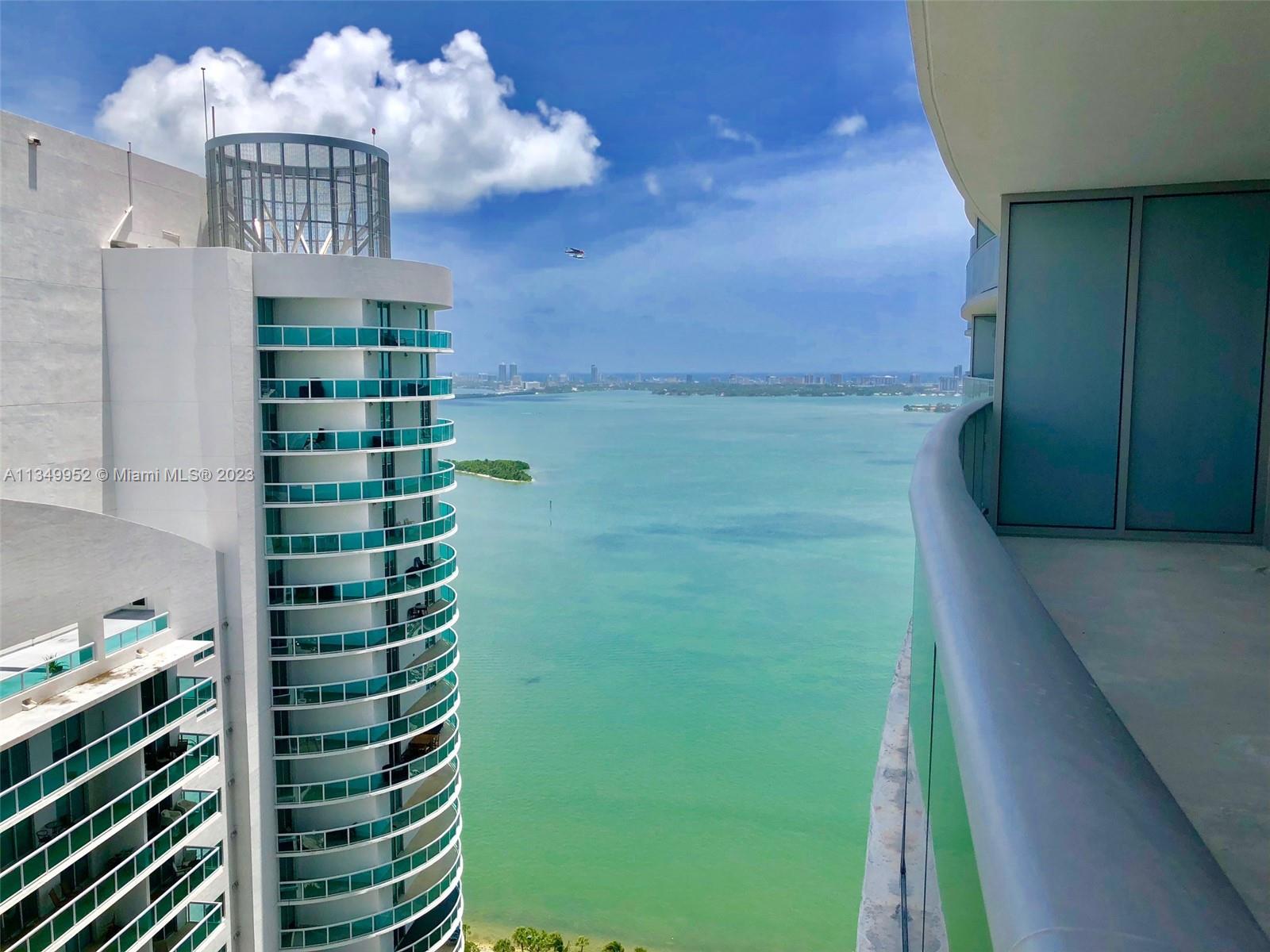 BEAUTIFUL 1/1.5 BATHS IN THE LUXURY BUILDING OF ARIA IN THE BAY LOCATED IN EAST EDGEWATER RIGHT ON N BAYSHORE DRIVE RIGHT ACROSS FROM MARGARET PACE PARK.VIEWS OF THE BAY.OPEN KICHEN W/QUARTTZ TOPS & ITALIANIN CABINETS & BOSCH APPLIANCES. 9FT CEILINGS.MASTER DUAL SINKS & SHOWER.CABLE,INTERNET,WATER & 1 PARKING INCLUDED IN RENT. Valet, Concierge, Sunrise & Sunset Pools, Hot Tub, BBQ Area, Gym, Party Room, Movie Theater, Business Center, Kids Play Room, Pool Tables... Walk to park, nightlife, banks, shops, restaurants, Publix, PAC & AAA. 5 minutes to South Beach, Downtown, Brickell, Wynwood, Design District & Midtown. Easy access to all major highways. EASY TO SHOW!