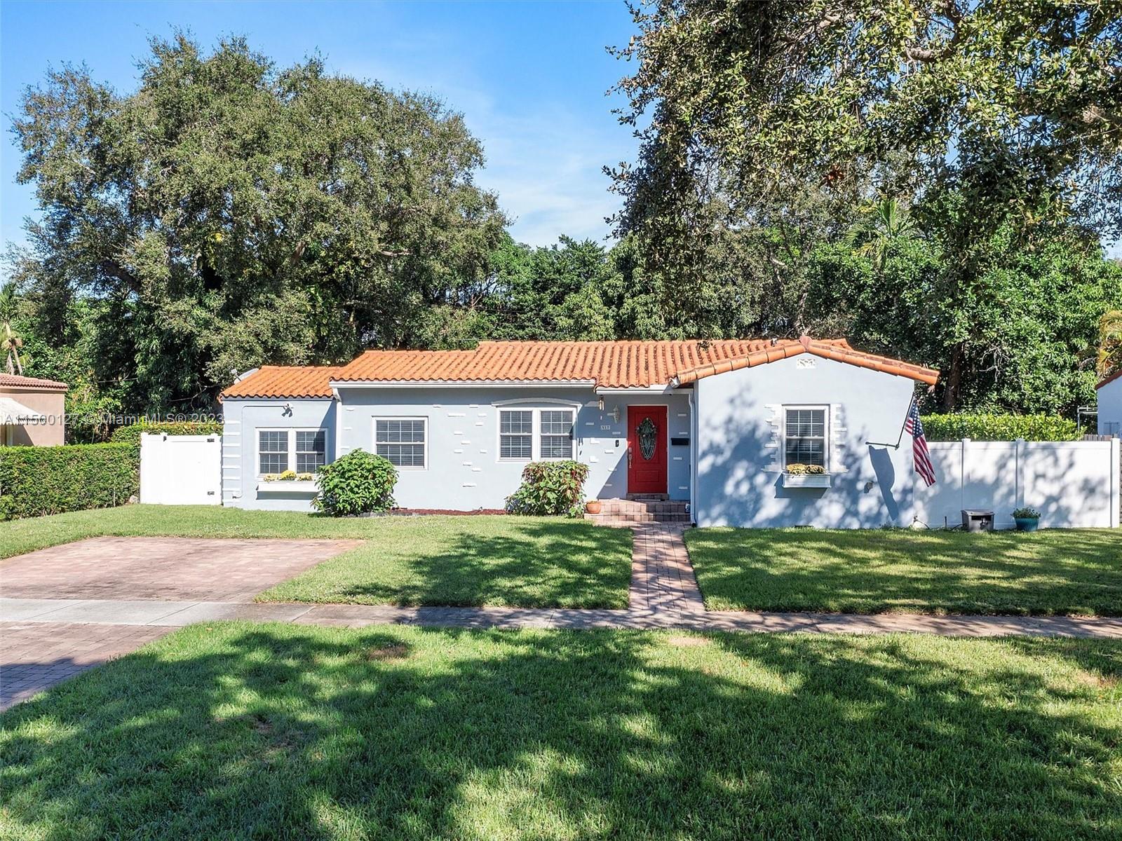 Step into the lively history of Miami Shores with this character home built in 1937. Filled with original details, the gleaming hardwood floors and art deco fireplace seamlessly blend with modern updates. Cooks will enjoy the stainless steel appliances and gas range while guests sit on the covered screened porch, splash in the pool or pick fruit from mature trees. This cheerful home boasts a whole-home generator, impact windows, tankless water heater and plenty of built-in storage. Enjoy the convenience of 3 full bedrooms plus a laundry room and a home office/den. Nestled in highly desirable Miami Shores, it's just a short drive to beaches and the best of Miami's attractions. Experience the perfect fusion of classic charm and modern living – your vibrant slice of paradise awaits!