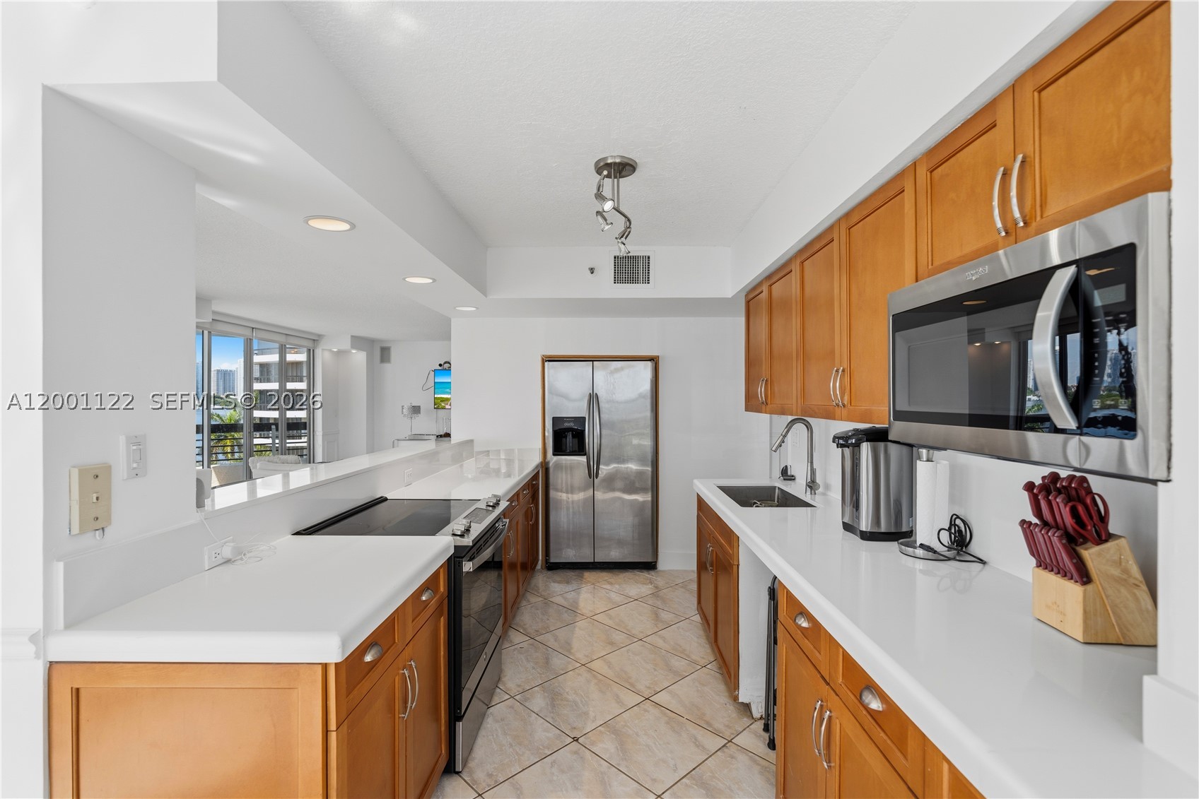 An exceptional opportunity to own a spacious corner residence in a highly sought-after waterfront community, aggressively priced to sell. This bright and well-designed unit features two bedrooms, two bathrooms, and a versatile den, along with an open kitchen, generous storage throughout, and the convenience of an in-unit washer and dryer. Enjoy abundant natural light and partial views of the water and Intracoastal, creating a serene and inviting atmosphere. This residence presents outstanding value for buyers seeking space, location, and upside in one of the area’s most desirable buildings.
The community elevates daily living with an exceptional array of amenities, including tennis, pickleball, and basketball courts, a fully equipped gym, on-site restaurant, optional marina for purchase or rent, mini market, dog park, and beautifully landscaped gardens that feel like a private retreat. All these complemented with EV charging stations, valet service, and 24/7 concierge. Adding peace of mind, the building is financially sound with ample reserves and has passed the milestone certification, making this not just a lifestyle upgrade, but a smart investment. A refined home, a resort-style environment—this is condo living at its best. Ideally located just minutes from Aventura Mall, beaches, and houses of worship, this residence delivers refined waterfront living with unmatched convenience.