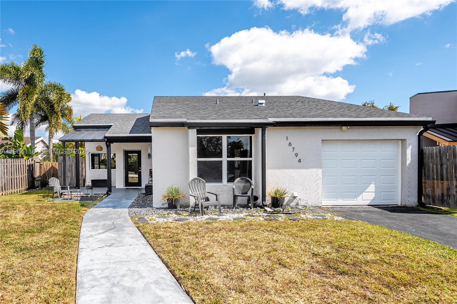 Recently appraised at $680,000 and priced well below appraised value, this beautifully updated 3-bedroom, 2-bathroom home sits on a quiet cul-de-sac in desirable Weston and offers exceptional value. Major upgrades include a NEW ROOF (2024), full IMPACT WINDOWS, and a large 3-panel impact sliding glass door, providing storm protection, energy efficiency, and abundant natural light throughout the open-concept living space. The thoughtfully designed interior features spacious living areas, modern finishes, and a custom built-in bunkbed, offering flexible space for family living, guests, or a creative room setup. Step outside to a covered patio with two built-in swings, perfect for relaxing or entertaining. The oversized backyard, made possible by the cul-de-sac location, offers ample space for outdoor enjoyment or future enhancements. Located near top-rated Weston schools, parks, shopping, dining, and major highways, this move-in-ready home also includes access to the outstanding amenities of Bonaventure Town Center, including pools, fitness center, tennis, bowling, racquetball, theater, and more. Low annual fees: Village Homes $275/year and Bonaventure Town Center $420/year, plus a $250 Bonaventure assessment paid in $50 annual installments through 2030. Homes with new roofs, impact windows, and cul-de-sac lots in Weston rarely become available at this price point.