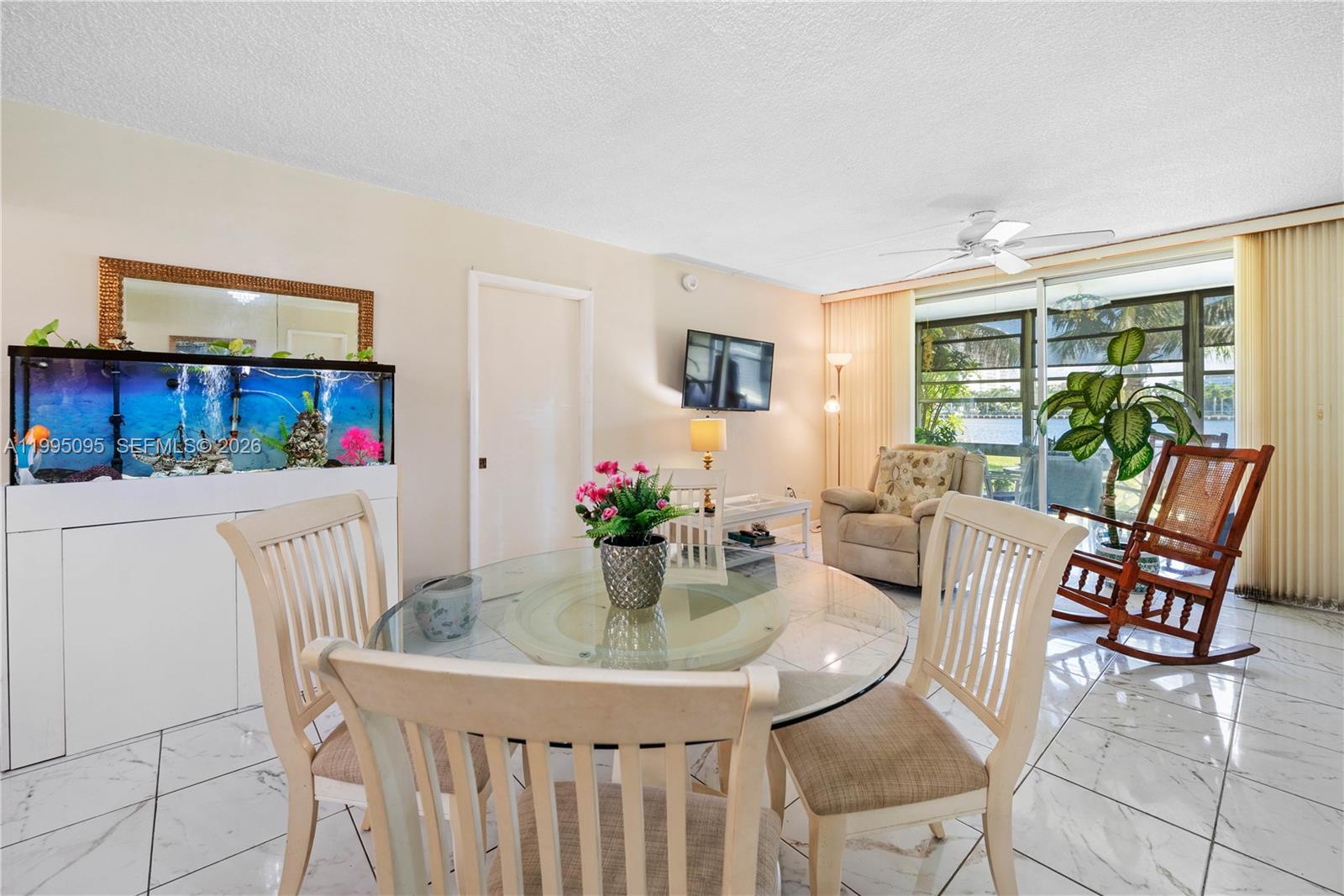 NICELY REMODEL UNIT. ONE BEDROOM, ONE BATHROOM WITH A WONDERFUL PORCH-BALCONY IN A VIBRANT 55+ COMMUNITY FEATURING AN STUNNING WATER VIEW. THIS UNIT IS FILLED WITH NATURAL LIGHT, OFFERING A BRIGH AND WELCOMING LIVING SPACE. RESIDENTS CAN ENJOY AN ARRAY OF AMENITIES INCLUDING A CLUBHOUSE WITH A GYM, BILLIARDS, BINGO BOWLING, CARD ROOM TABLE TENNIS AND FIVE POOLS. THE COMMUNITY ALSO BOASTS A 2-MILE WALKING PATH AROUND THE COMPLEX, PERFECT FOR LEISURELY STROLLS BY THE BAY. A COURTESY BUS PROVIDES CONVENIENT TRANSPORTATION TO THE MALL, NEARBYBEACH, SHOPPING CENTERS, AND RESTAURANTS. THIS GATED COMMUNITY OFFERS A SECURE AND ACTIVE LIFESTYLE. DON'T MISS THE OPPORTUNITY TO MAKE THIS BEAUTIFUL PROPERTY YOUR OWN