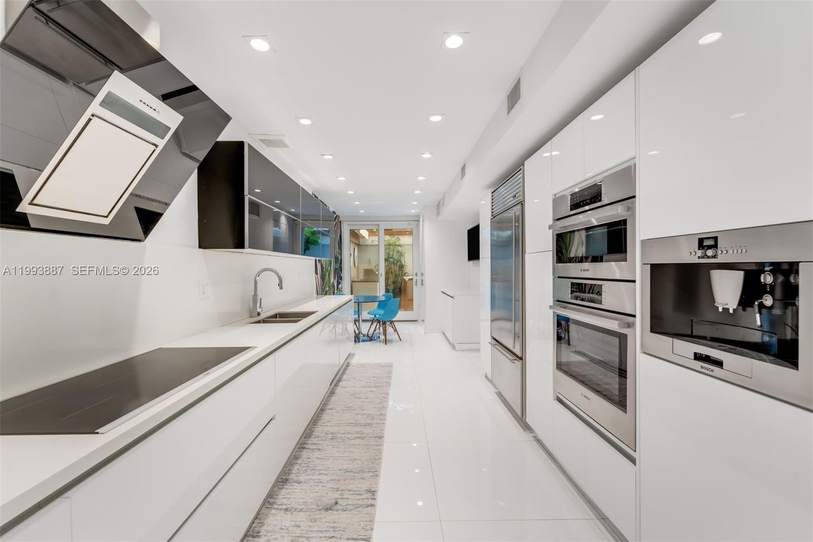 Stunning, fully renovated 3-story townhouse in the exclusive, guard-gated Quayside community. This 3-bedroom, 3.5-bath residence features a private elevator, impact windows, and an impressive master suite with soaring 20-foot vaulted ceilings. Every detail has been thoughtfully updated, offering a perfect blend of luxury and comfort. Enjoy resort-style living with access to 32 acres of lush grounds, two on-site restaurants, tennis courts, a full-service gym/spa, marina, and endless amenities. A rare opportunity in one of Miami’s most secure and amenity-rich communities.