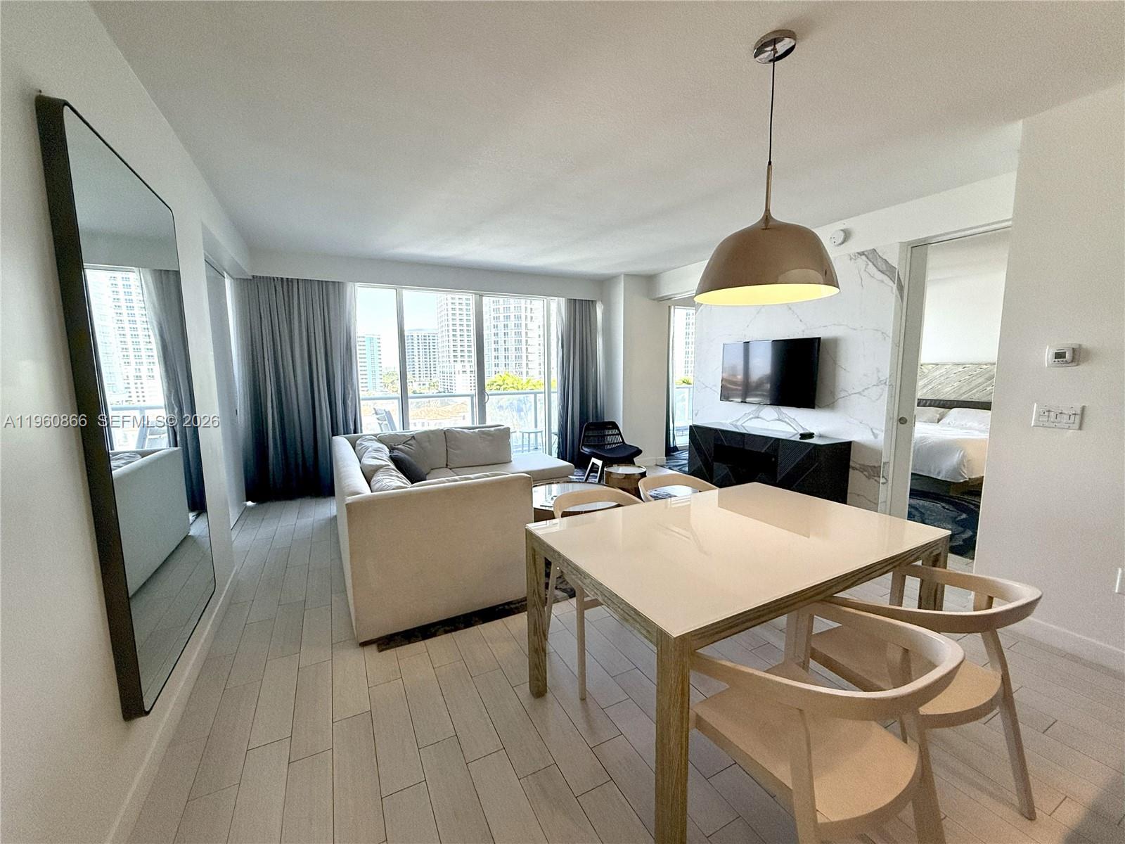 Oceanfront luxury living at its finest. Fully furnished, 2-bedroom/2-bathroom North facing residence offers floor to-ceiling garden, partial ocean and city views. An open layout, spacious balconies and stylish design round out this turnkey condo, complete with washer/dryer, full-size kitchen and top-of-the-line appliances. Enjoy resort-style amenities including 2 pools (east and west), AWAY Spa, fitness center, Living Room bar, Sushi Bar, Steak 954 and El Vez restaurants by Stephen Starr just an elevator ride away. No Rental Restrictions. Oceanfront resort style living at its finest. Fully furnished,                 2-bedroom/2-bathroom