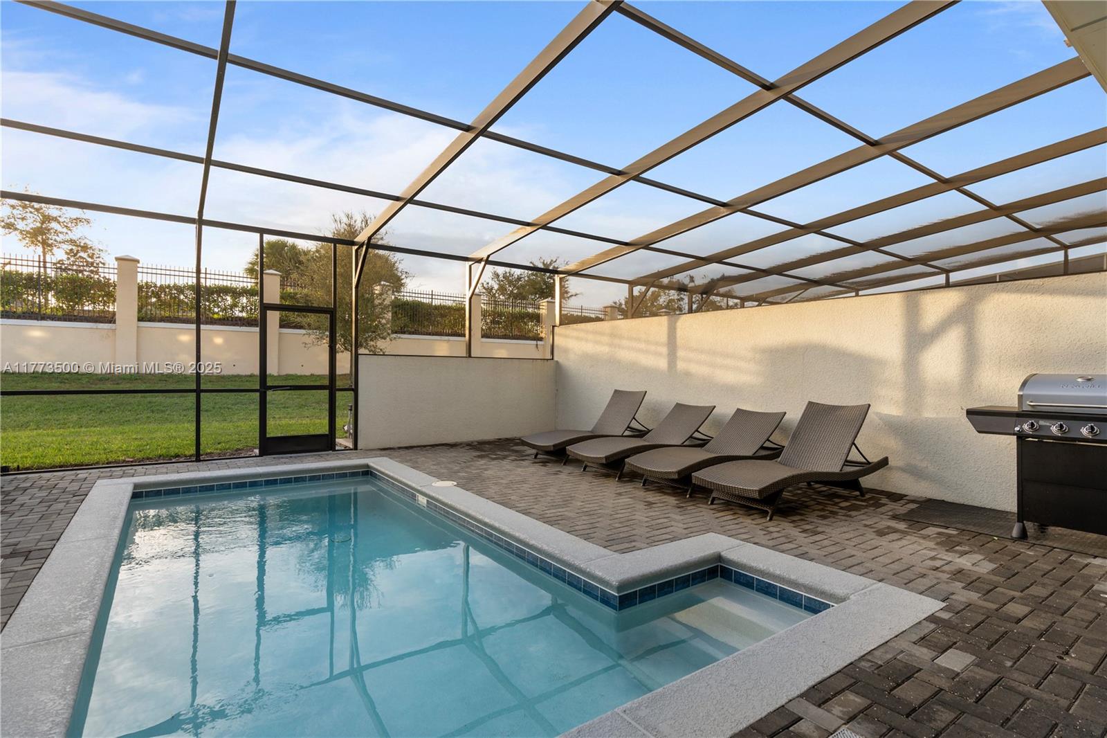 Located in Windsor at Westside, one of Kissimmee's premier SHORT-TERM RENTAL COMMUNITIES, this fully furnished townhouse offers a luxurious and relaxing retreat. The open floor plan seamlessly integrates the living, dining, and kitchen areas with five spacious bedrooms and four-and-a-half bathrooms. The kitchen boasts elegant granite countertops and sleek stainless steel appliances. Upstairs, a spacious loft provides an additional living area, ideal for relaxation, entertainment, or a home office. The private pool is accessible through pool-facing telescopic sliding glass doors, leading to a screened-in lanai for serene evenings under the stars.?Windsor at Westside offers world-class amenities, including an 8,000 sq ft clubhouse with a lazy river, sports courts, ..