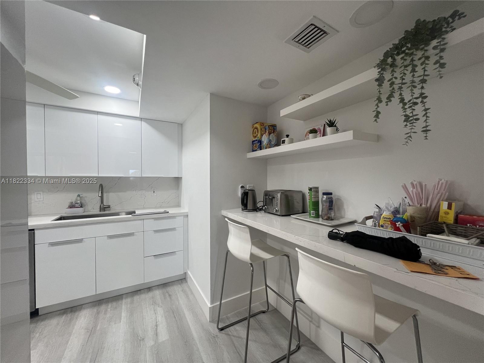 Beautiful ocean view  condo with direct access to beach and pool area through private patio. 2 bed, 2 bath unit featuring a fully equipped kitchen with quartz countertops. The spacious master suite includes a large walk-in closet, double linen closets, a shower and separate tub, bidet and vanity. Guest bathroom has a large shower and includes an in-unit washer and dryer.  Semi private entrance elevator that goes directly to your parking space. Enjoy pool and garden views from private balcony. Sea Ranch offers beautifully maintained oceanfront grounds, resort-style amenities, breathtaking views just steps from the sand. 24/7 security, 3 pools, tennis courts, private beach access,  Walk to charming shops, dining, and entertainment in this vibrant coastal town.