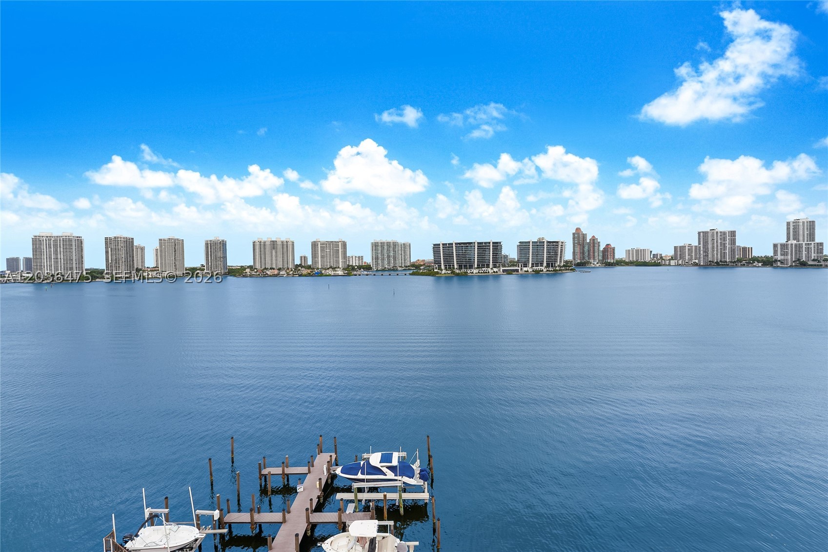 Welcome to Penthouse 02, an extraordinary waterfront residence in prestigious Sunny Isles Beach. This spectacular corner penthouse offers the perfect blend of luxury, privacy, and breathtaking scenery, featuring unobstructed Intracoastal and ocean views from every room. Boasting 3 spacious bedrooms and 3 beautifully appointed bathrooms, including 2 en-suite baths, this one-of-a-kind home has been completely remodeled with exceptional attention to detail. Impact windows and doors, imported custom cabinetry, top-of-the-line appliances, designer fixtures, and premium finishes throughout reflect timeless elegance and superior craftsmanship. Offered fully furnished, this remarkable residence delivers sophisticated coastal living at its finest. Nestled directly on the Intracoastal Waterway, this exclusive boutique community is just moments from the white sandy beaches of Sunny Isles, Bal Harbour Shops, Aventura Mall, Oleta River State Park, world-class golf courses, luxury shopping, fine dining, marinas, and endless entertainment. Rarely available, this exceptional penthouse presents a unique opportunity to own over 2,220 square feet of beautifully designed living space in one of South Florida's most desirable waterfront destinations. Experience the ultimate blend of luxury, location, and panoramic water views