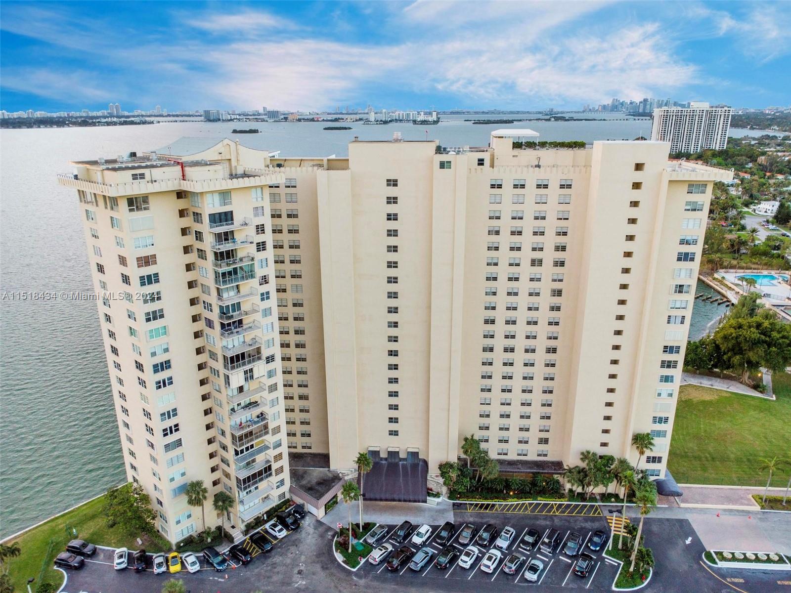Located directly on Biscayne Bay with spectacular water and evening skyline views from all rooms.  Centrally located near Bal Harbor, Aventura and Lincoln Road.  Walking distance to grocery stores, restaurants and shops. Great opportunity to make this grand residence your own. Currently appointed with 1 extra large master bedroom with cedar-lined built-in closets, 2 separate his and hers master bathrooms with oversized spa tub, steam shower, heated towel racks, rain shower, bidet/water closet.  Plenty of built-in storage for linens and accessories.  Powder room with additional built-in storage. Built-in wine storage closet in bar area of the open living room.  Building has concierge service and is dog-friendly and rent-friendly.  Newly renovated, modern reception area.  Swimming Pool.