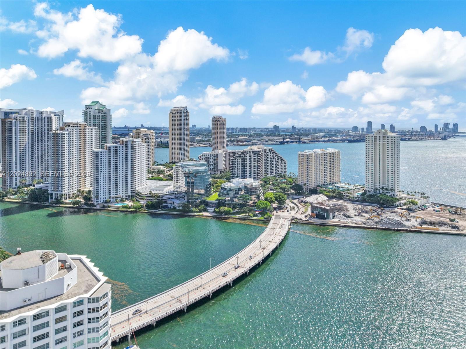 Spectacular bay views from this stunning 42nd-floor residence located in the heart of Brickell. Impeccably maintained and feeling like new, this unit is among the few in the building featuring soaring 10-foot ceilings, strategically designed to maximize breathtaking views of Biscayne Bay and the Miami skyline. Boasting 1,101 SF of interior space plus 148 SF private balcony, this residence offers the perfect blend of comfort, luxury, and seamless indoor-outdoor living. This residence features an open-concept split floor plan and elegant marble floors throughout. Two spacious walk-in closets with ample storage, and the unit is offered partially furnished for added convenience.The primary suite includes a spa-style soaking tub and a separate glass-enclosed shower From the expansive balcony, enjoy panoramic views of Brickell Key, Miami Beach, Biscayne Bay, and the city skyline.The Plaza is a pet lover's paradise and the Brickell Bay Animal Hospital is just off the lobby! Resort-style amenities including 2 serene swimming pools with poolside cabanas, sauna, state-of-the-art fitness center, business center, theater, 24-hour security, and valet parking. Perfectly situated in one of Miami’s most vibrant neighborhoods, residents can enjoy sunset strolls along the bay just steps from the building.Conveniently located within a short 5-minute walk to the upscale shopping, dining, and entertainment of Mary Brickell Village and Brickell City Centre