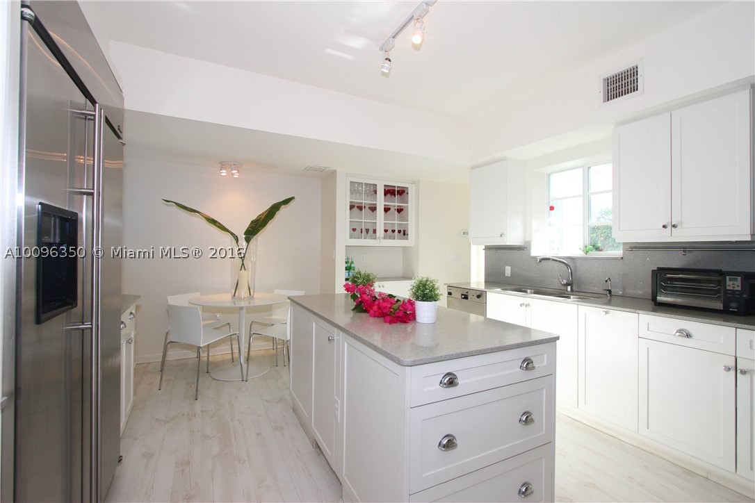 DEAL DEAL DEAL!!! Exclusive Sunset Island 4. Ideal location within walking distance from Lincoln Rd and vibrant Sunset neighborhood. Large front garden, impact windows and doors, 3 bed/2 bath up 1/1 downstairs, tv room and maid's quarter. Many original details  2 car garage The covered patio by the pool accommodates both sitting and dining areas. Private dock and lift . 75' on the canal needs a bit of TLC Bring offers!