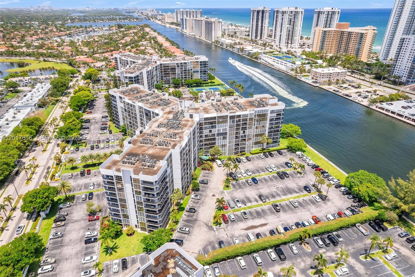 Experience BREATHTAKING PANORAMIC VIEWS from this TOP-FLOOR CONDO, where you can enjoy spectacular sunsets overlooking THREE ISLANDS, HALLANDALE BEACH, and beyond from your private balcony. This updated 2-BED/2-BATH residence features TILE FLOORING, FLOOR-TO-CEILING WINDOWS, and abundant closet space, with HOTWIRE FISION TV + HIGH-SPEED INTERNET INCLUDED. Located in a waterfront, walkable, GATED COMMUNITY, you’re moments from parks, playgrounds, WORLD-CLASS BEACHES, dining, entertainment, shopping, and golf. Resort-style amenities include an INTRACOASTAL POOL, sun deck, BBQ area, fitness center, tennis courts, and clubhouse, plus 24-HOUR SECURITY, front desk service, ASSIGNED PARKING, guest/street parking, a storage unit, and same-floor laundry. INVESTOR FRIENDLY – RENT IMMEDIATELY! Situated in the exclusive and highly sought-after THREE ISLANDS AREA, just minutes to the beach. Contact us today to schedule a private tour!