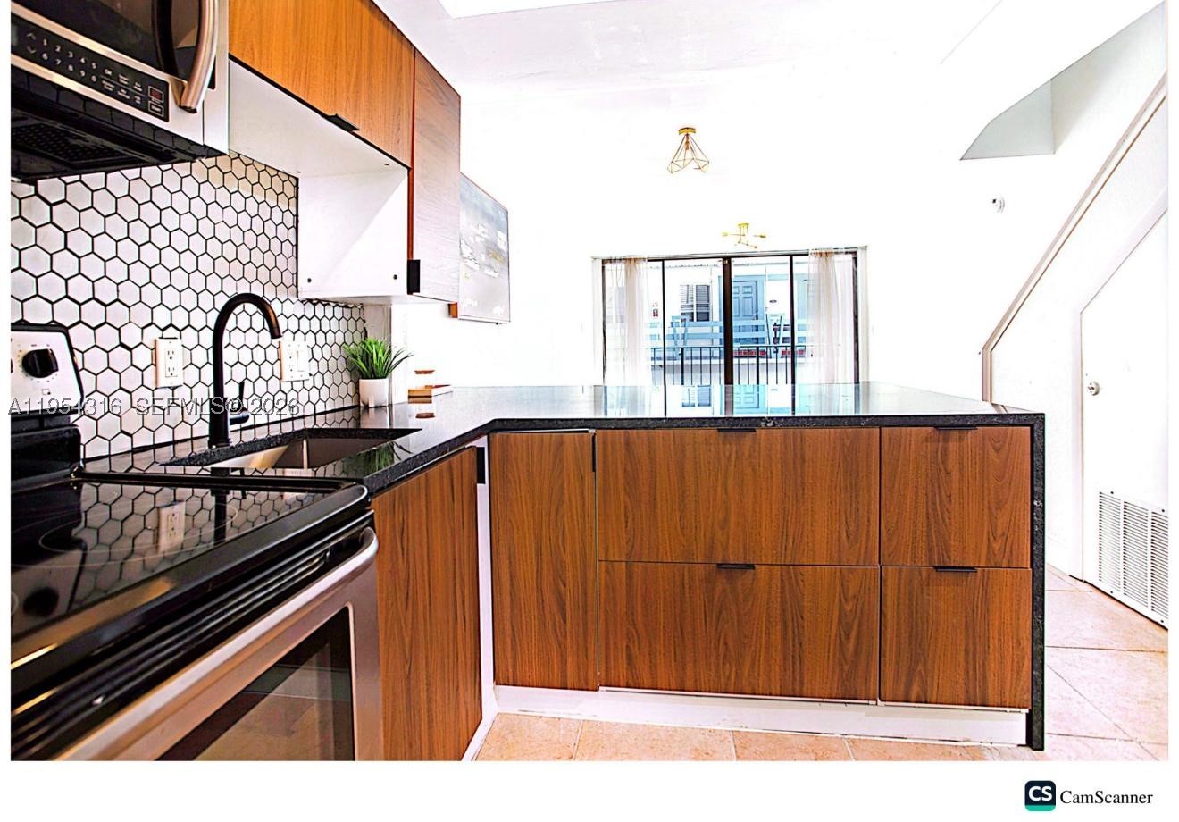 FULLY REMODELED
NEW AC UNIT
NEW WATER HEATER
NEW ELECTRIC BOX
NEW KITCHEN

PRICE DROP!!!!  CONDO HAS HEALTHY RESERVES WITH THE REQUIRED 10% RESERVES IN PLACE!!!!Beautifully updated condo located in the desirable Quarterdeck Condominium in Fort Lauderdale. This spacious unit features a modern, open layout with a completely renovated kitchen, updated cabinetry, countertops, and appliances. Recent upgrades include a new A/C unit, new water heater, and new electrical panel, offering peace of mind for the next owner.

The residence offers generous living and dining areas filled with natural light, along with comfortable bedrooms and updated finishes throughout. Well-maintained building with a prime location just minutes from beaches, dining, shopping, and major roadways. Ideal for a primary residence or seasonal use. EMOTIONAL SUPPORT ANIMALS PERMITTED.