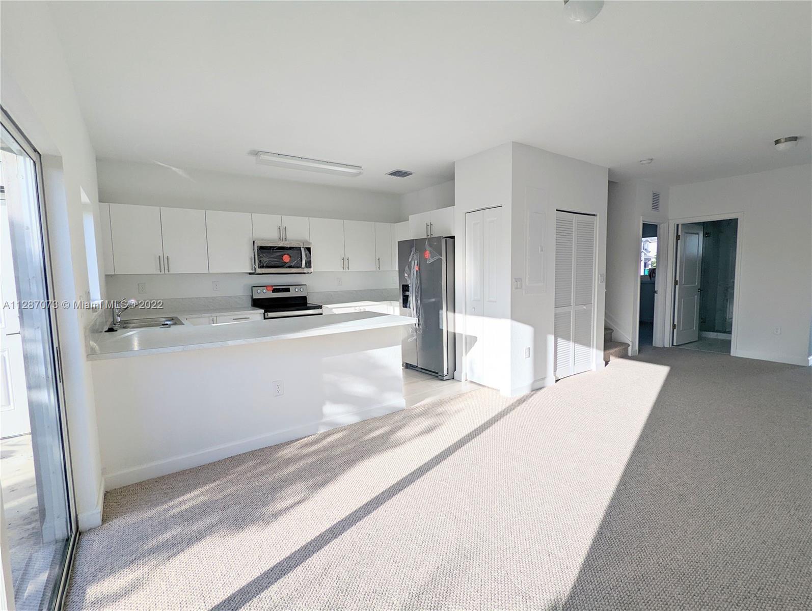 BE THE FIRST TO LIVE IN THIS  Brand New 4/3 Townhome. Two assigned parking spaces with first floor entry. One bedroom and full bathroom on first floor.  Stainless steel appliances. Fenced backyard. Several guest parking available. Fast Approval, Close to major highways and minutes away from Florida Keys and National Parks.