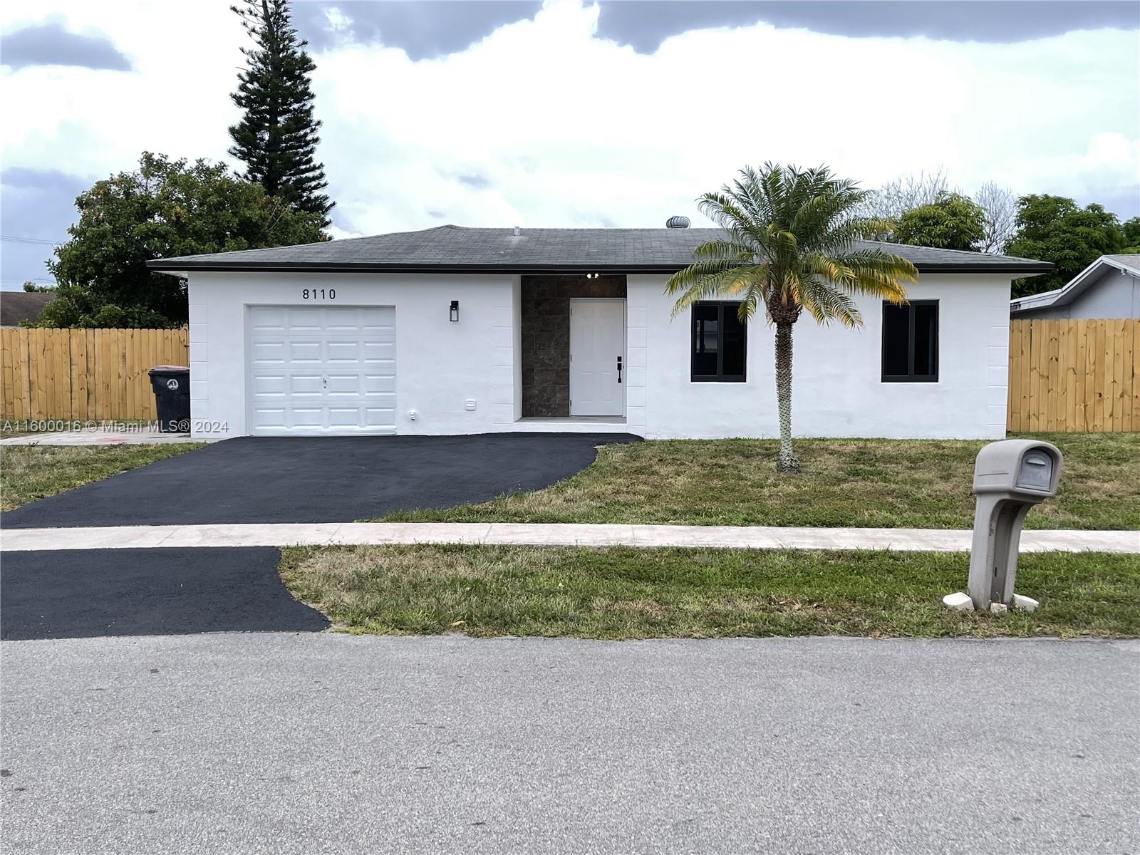 Discover your dream home in the heart of North Lauderdale, Florida! This beautifully remodeled 3-bed, 2-bath home features a spacious den, ideal for a home office or extra guest space and a wet bar for entertaining guests. Step inside to an open-concept living area adorned with modern finishes, elegant flooring, and abundant natural light. The gourmet kitchen boasts top-of-the-line appliances, sleek countertops, and ample cabinet space.

Retreat to the luxurious master suite with an In-suite bathroom that offers a spa-like experience. Outside, an inviting pool awaits, perfect for relaxing or entertaining on warm Florida days. The lushly landscaped backyard provides privacy and a tropical oasis feel. Home also offers new impact Windows!