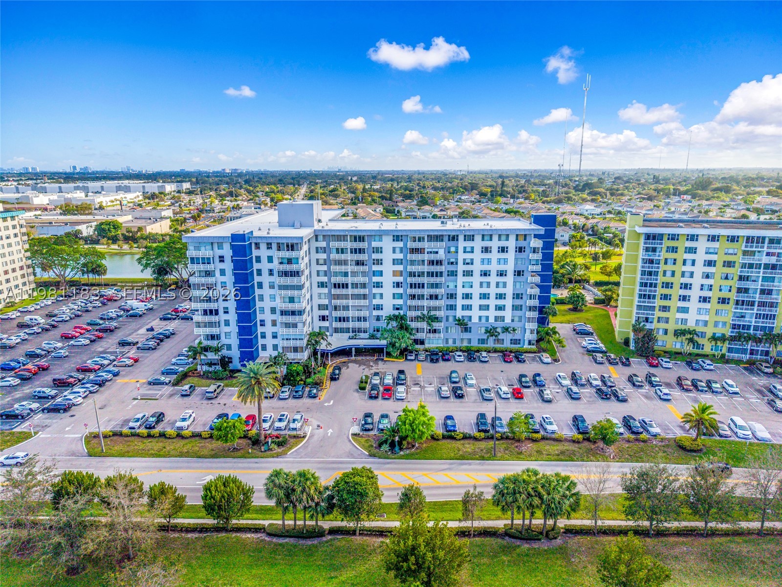 Sun-filled 2-bedroom, 2-bath corner condo offering 1,284 square feet of comfortable living. Ideally located on the 2nd floor for easy access with no elevator needed. The residence features tile flooring throughout, abundant natural light, and an updated kitchen with granite countertops and stainless steel appliances. Enjoy a spacious balcony perfect for relaxing and taking in the South Florida breeze. Located in a well-maintained 55+ community offering resort-style amenities including tennis and pickleball courts, walking and jogging paths, a pool, and an elegant lobby with a 24/7 attendant. Includes one assigned parking space with ample guest parking available. Association requires a minimum 700 credit score and does not allow rentals. Conveniently located near major roadways, shopping, dining, and the beaches. Easy to show. Click on showing time.