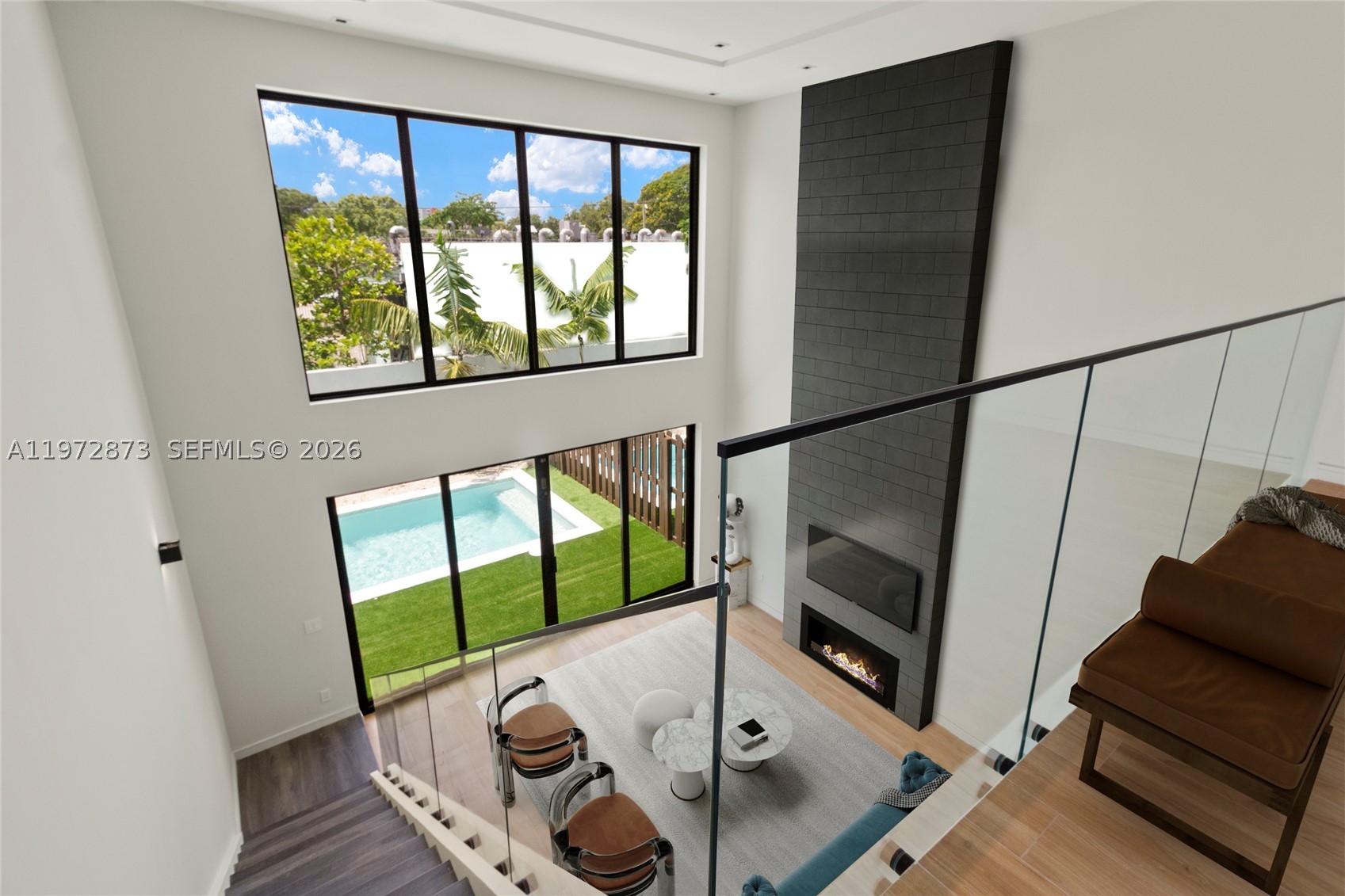Welcome to The MiMo 62nd Sky Collection, two exclusive residences in the heart of the MiMo District. This freestanding luxury property features two side-by-side, three-story homes each with a private pool & rooftop terrace. Each residence offers 4 bedrooms & 4.5 bathrooms, seamlessly blending the scale of a single-family home with the sophistication of a modern, design-forward build. The first level is dedicated to entertaining, highlighted by 22-foot ceilings, an expansive lounge & direct access to a private ground-floor pool. The second level unveils an open-concept living & dining space centered around a chef’s kitchen featuring custom European cabinetry, an oversized eat-in island, and Fisher & Paykel appliances. A seamless blend of light and scale defines the interiors, with floor-to-ceiling windows and soaring ceilings throughout, complemented by bespoke finishes and custom-designed doors that elevate every space. The third level is anchored by the primary suite thoughtfully appointed with a spa-inspired bath featuring a two-person shower, soaking tub and an expansive custom walk-in closet. Two additional bedrooms, each with en-suite baths and tailored closet systems, complete the upper level. The rooftop terraces offer the ultimate in outdoor living, designed for customization with endless upgrade options. The residences share a secured entry lobby & a private garage with direct access to each home. Ready for delivery, schedule your tour today.