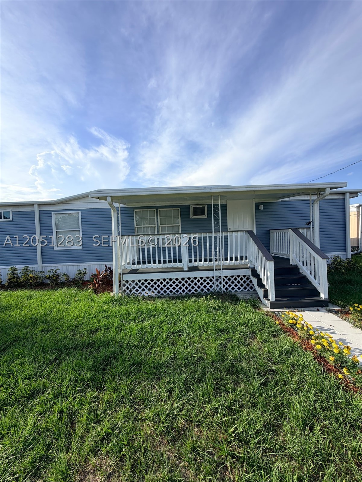 Motivated seller. Nice property with canal access in back. Lot is 75' X 110'.
1,456 Sq Ft mobile home (26' X 56') was renovated in 2025. 
3 bedrooms, 2 full bathrooms, 2 family rooms.
New roof with warranty, new siding, new front porch, new skirt, new plumbing, new HWH, new insulation.
All new interior, new bathrooms, new kitchen & appliances, quartz countertops, new flooring.
Sea wall with area for boat docking.
Sewers are coming and seller has paid for the connection and it transfers to buyer ($8,000 value).