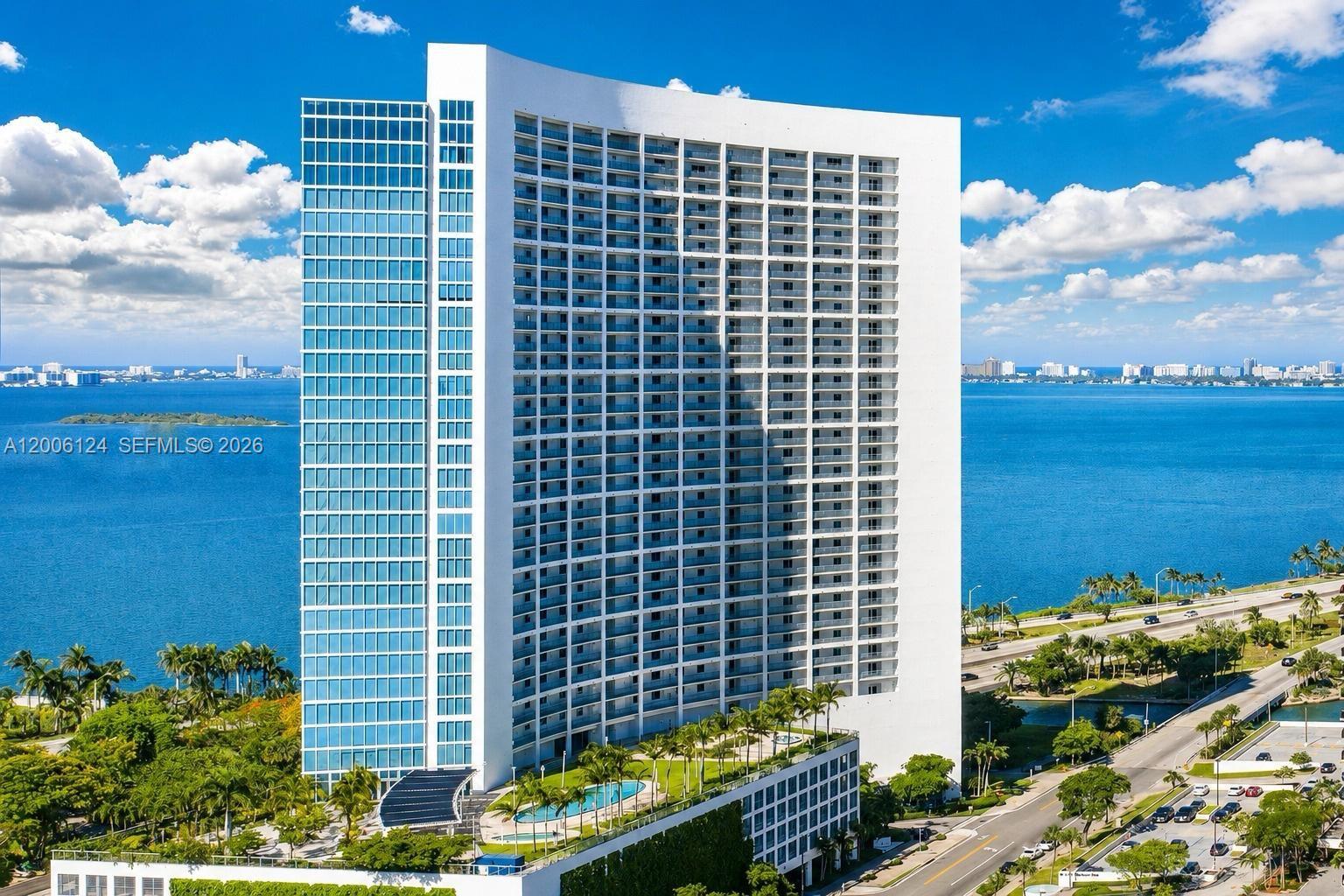 Located in one of Miami’s fastest-growing luxury corridors, this high-floor residence at Blue on the Bay offers unobstructed, protected views of Biscayne Bay. Unit 1404 stands out in today’s evolving Edgewater market with a rare advantage: its primary water views are not impacted by nearby or future developments. As the neighborhood continues to attract luxury branded projects and major investment, this residence remains positioned on the quiet side, facing the bay and away from direct construction corridors, preserving both privacy and long-term value. Recently upgraded with a renovated kitchen including wine cooler, new washer and dryer, finished closets, keyless entry, and fully renovated bathrooms. Designed by Arquitectonica, Blue on the Bay offers a full-service lifestyle with two pools, including a lap pool, jacuzzi, BBQ area, gym, business center, party room, and 24-hour valet and front desk. The building’s lobby is also scheduled for remodeling, adding further appeal to this well-positioned asset. Ideal for both end-users and investors seeking a stable, high-demand residence with protected views. TENANT OCCUPIED