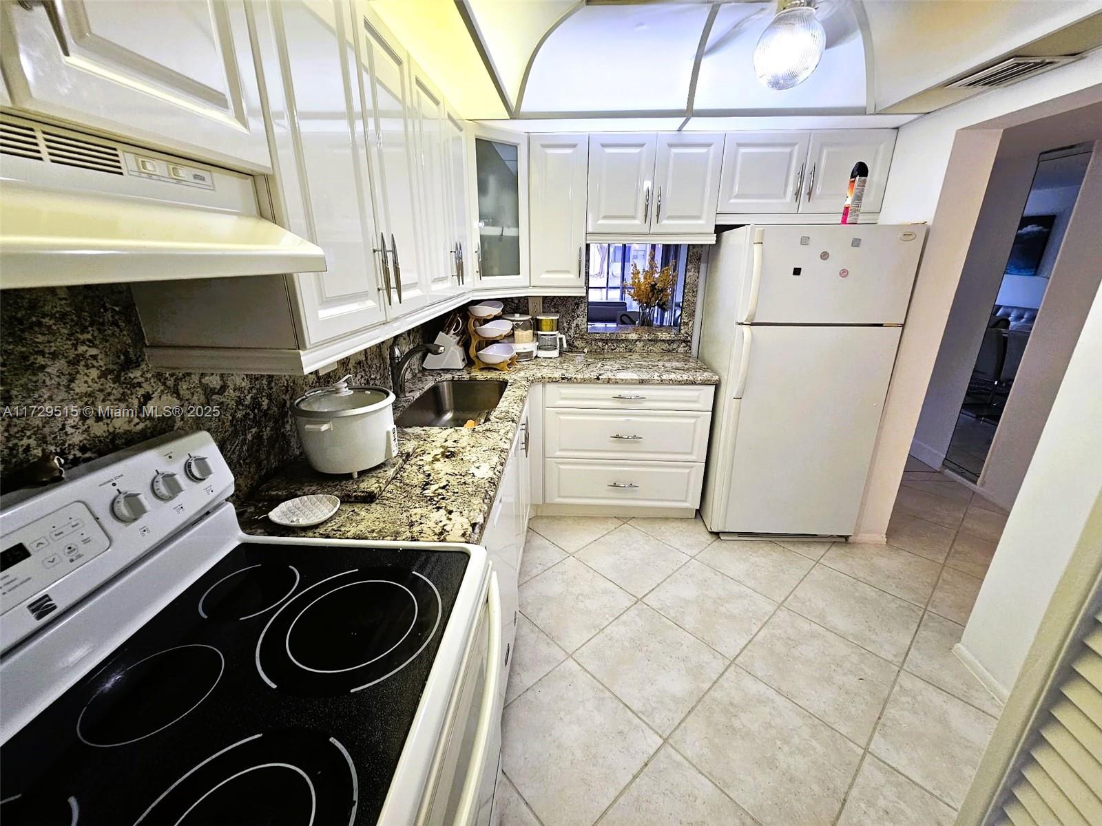 VERSAILLES GARDENS CONDO - Residential Lease