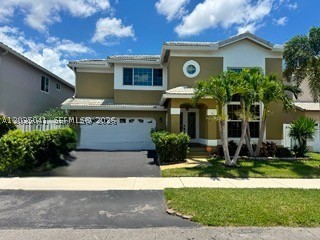 SPACIOUS AND WELL MAINTAINED 4 BEDROOMS, 2.5 BATHROOMS SINGLE FAMILY HOME WITH A 2 CAR GARAGE IN COCONUT CREEK. FEATURES INCLUDE VAULTED CEILINGS AND OPEN LIVING SPACES, CREATING A BRIGHT AND AIRY INTERIOR. THE FIRST FLOOR IS TILED THROUGHOUT, WITH LAMINATE FLOORING ON THE STAIRWELL AND ALL UPSTAIRS BEDROOMS. SCREENED PATIO AND FENCED YARD. PET FRIENDLY COMMUNITY FEATURING A CLUBHOUSE WITH A SWIMMING POOL.