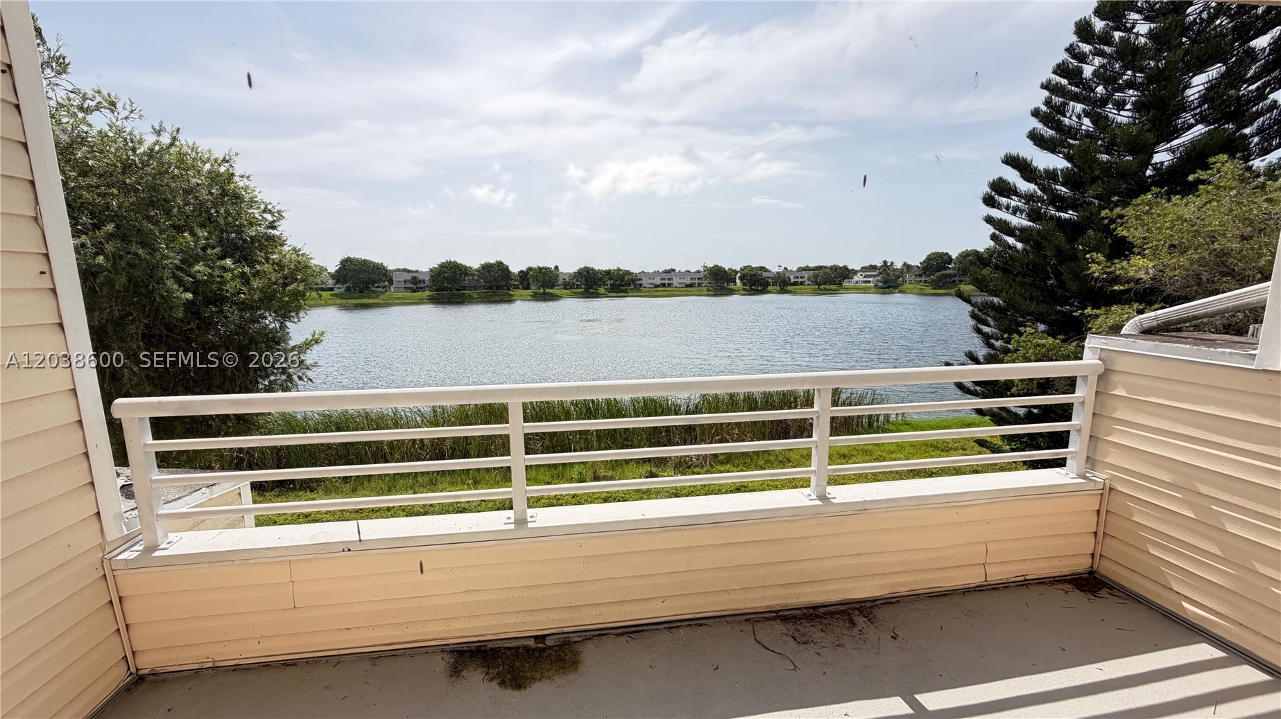 This 1st floor, well maintained 2 bedroom, 2 bathroom condo offers breathtaking lake views and an desirable South Florida location only 5 miles from Fort Lauderdale beach with quick access to the Turnpike and I-95. Featuring soaring vaulted ceilings, this bright and spacious home & pet-friendly, gated community. Residents enjoy an impressive array of amenities, including a sparkling pool, fitness center and a scenic walking trail that winds around the lake. With ample parking and an easy approval process, this condo is ideal for both owner-occupants and investors seeking strong rental potential.