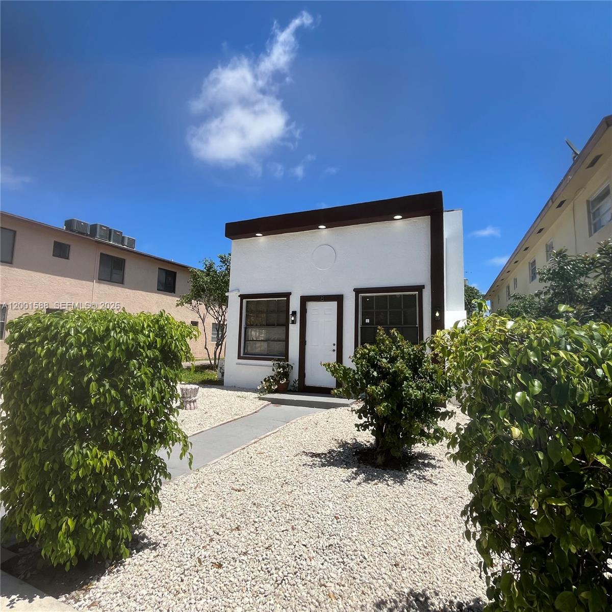 Excellent opportunity for a primary residence or investment in Lake Worth Beach!!. This charming 2-bedroom, 2-bathroom, 3,375 sqft lot. and has been recently enhanced with new flooring and a beautifully updated kitchen, including refrigerator, range oven, and microwave. It is move-in ready, offering both comfort and immediate potential for income generation. Enjoy the benefit of NO HOA, providing greater flexibility and freedom—an ideal advantage for buyers looking to personalize, expand, or maximize their investment. Ideally located in an area experiencing ongoing revitalization and growth, you’ll be just minutes from cultural centers, dining, entertainment, and the beach, all while benefiting from strong rental demand.Properties with this level of versatility and potential are rare. Easy to show and currently vacant—schedule your private tour today and discover the opportunity waiting for you!!!