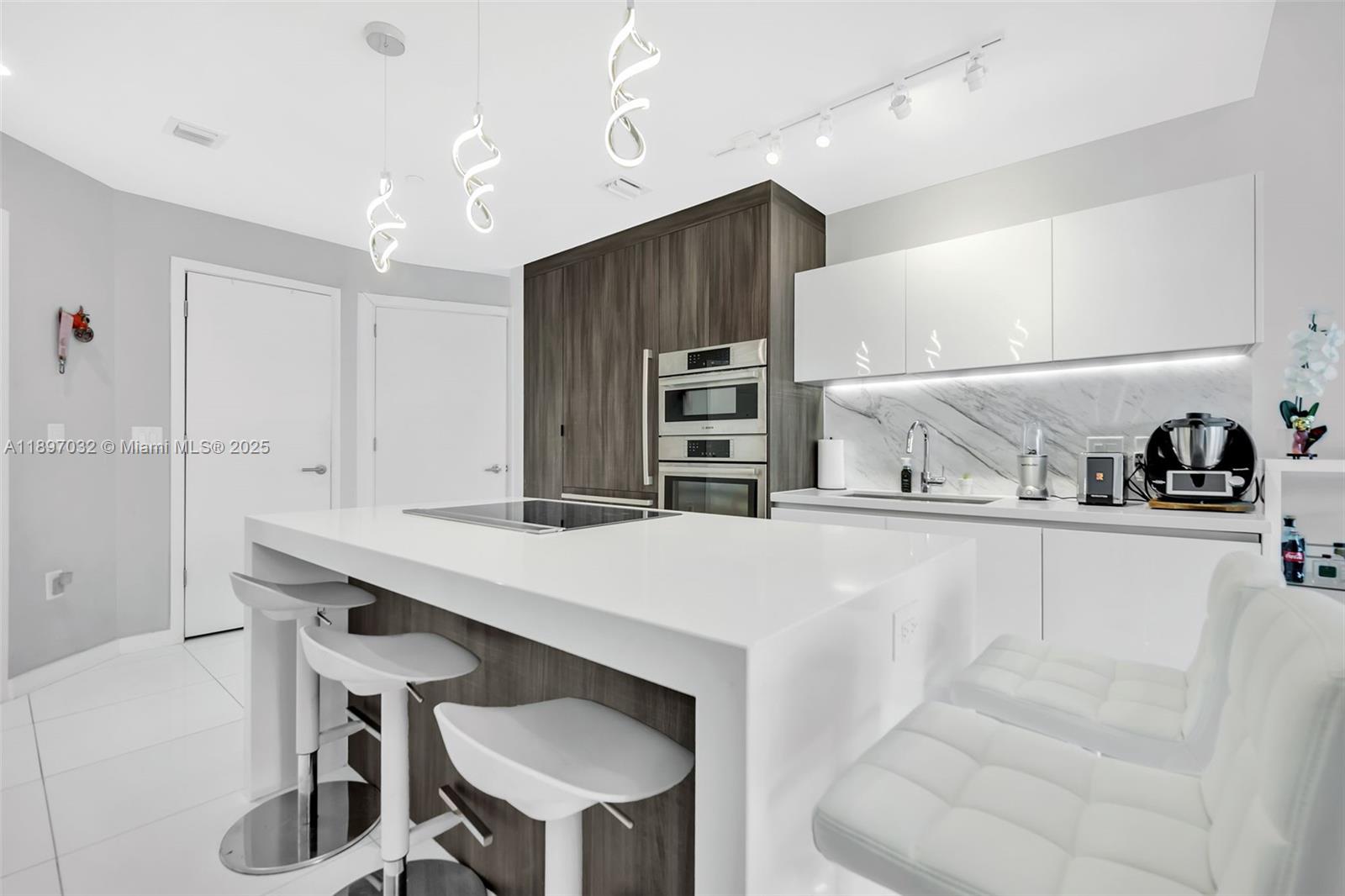 Welcome to Paramount Miami Worldcenter, where luxury meets lifestyle in the heart of downtown Miami. This stunning 2- bedroom (converted den) ,2-bath residence (Unit #806) spans approximately 1,178 sq. ft. and offers a seamless blend of modern design, comfort, and sophistication.Located within walking distance of the Kaseya Center, Brightline Station, Bayside Marketplace, and Bayfront Park, this residence places you in the center of Miami’s most dynamic district.