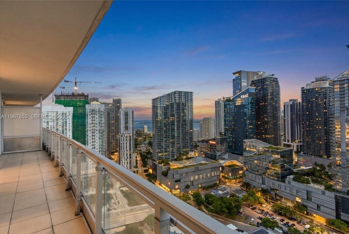 Welcome to the highly desirable Mint Condominium in Brickell. This stunning 2-be/2-bath split floorplan residence sits high on the 38th floor, offering breathtaking panoramic views of the Brickell skyline and the iconic Miami River. Enjoy front-row views of the city’s energy, passing yachts, and even dolphins—all from your spacious private terrace. The unit features porcelain tile flooring throughout, Italian-style cabinetry and appliances, in-unit washer and dryer, and floor-to-ceiling windows that flood the home with natural light. Ideally positioned adjacent to the future Faena Cultural District, this residence benefits from the upside of a world-class cultural destination without impact to the view—and at a fraction of the cost of the future Faena residences. An unbeatable combination of luxury, value, and location, just steps from Brickell’s premier shopping and dining, the Metro Station, and Brickell City Centre, with easy access to major highways. Mint is a gated riverfront community offering five-star resort-style amenities, including a pool, spa, fitness center, meditation garden, business center, activity rooms, Riverwalk, and more.