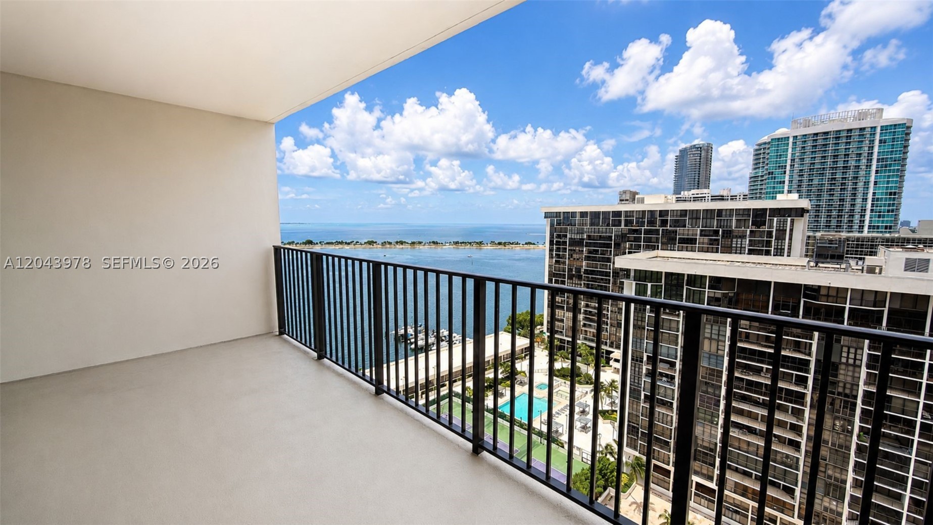 Spacious and beautifully maintained one-bedroom, one-and-a-half-bath residence at Brickell Place, offering over 1,000 square feet of comfortable living space with stunning bay, ocean, and city views. This bright residence features laminated wood floors throughout, an updated kitchen, a new vent-less washer and dryer, generous closet space, and a private balcony perfect for enjoying the Brickell skyline and waterfront scenery. Located in the highly desirable B Building of Brickell Place, residents enjoy resort-style amenities including a community pool, fitness center, sauna, activity room, pool table, gated entry, security patrol, and assigned covered parking. Perfectly situated in the heart of Brickell, just moments from restaurants, shopping, entertainment, and everything Miami’s urban lifestyle has to offer.