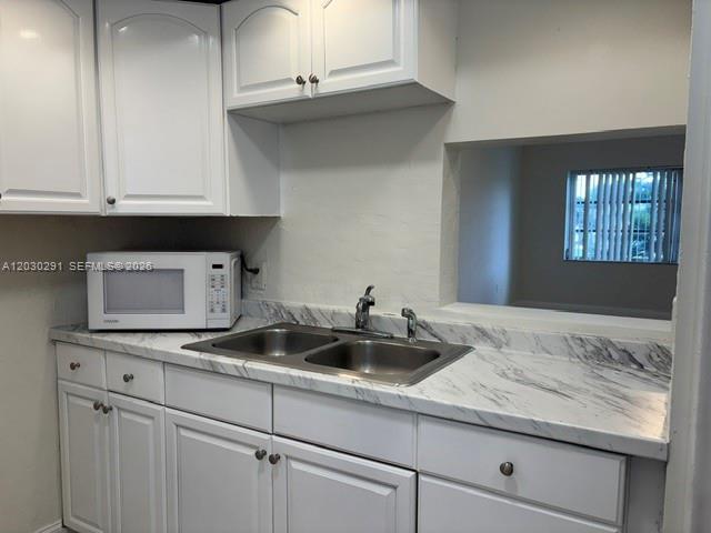 Beautifully renovated 1/1.5 in the heart of Aventura. Spacious and clean, located on the second floor with lakeview with glasses balcony. Tile floors throughout, all new light fixtures, fans, and blinds. Community features pool on the lake, security patrol, and laundry facilities. Only asking for the first month and security deposit. Easy to show, vacant, on lockbox and ready for move in right away.