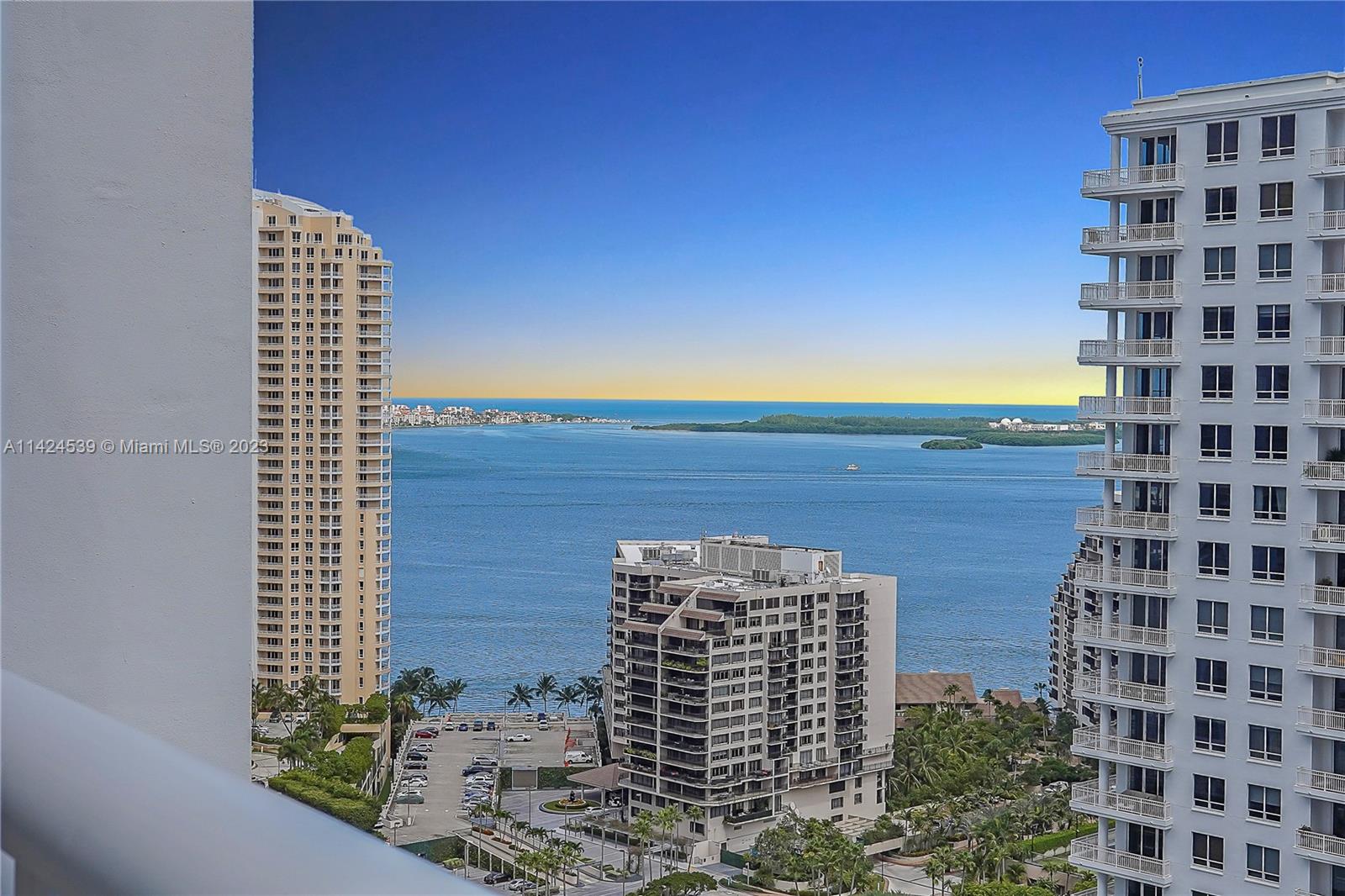 The best and most dramatic line in luxurious Carbonell on exclusive Brickell Key Island. Enjoy island life with 180 degree views from the entire west side of the building which offers open bay and breathtaking city skyline views from this 29th floor unit. Floor to ceiling windows with 2 balconies on each side. Split floor plan offers privacy for every bedroom. Carbonell offers top amenities including 2 tennis courts, golf putting area, indoor racquetball court, indoor basketball court, heated swimming pool great for lap swimming, jacuzzi, BBQ area, private childs playroom, party room, conference room, computer room, 2 story gym with the latest equipment. Brickell Key offers top amenities with a short bridge leading you from private island life to exciting restaurants and nightlife.