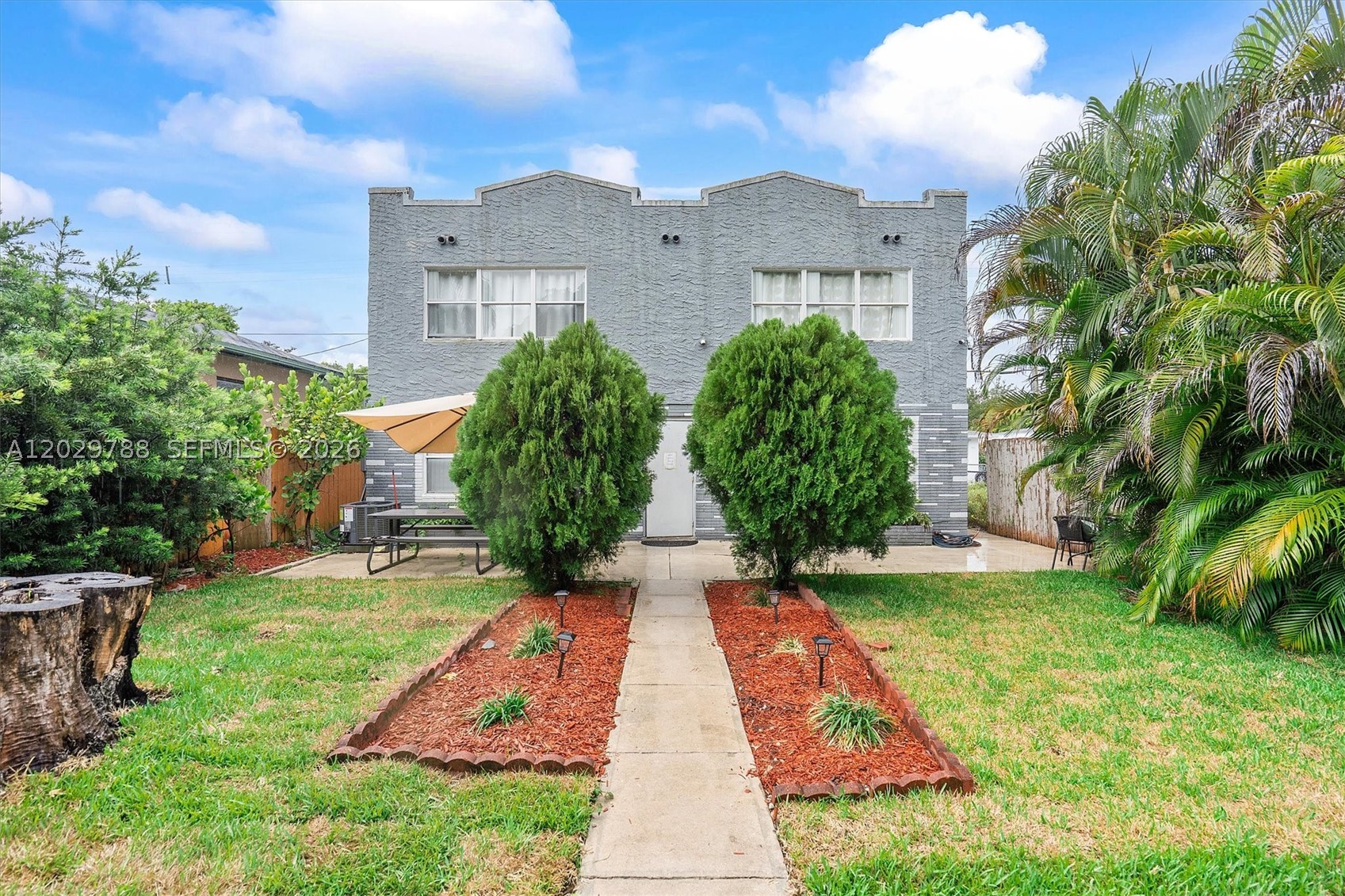 Rare opportunity to own an income-producing triplex with future redevelopment potential. This property features one 2-bedroom, 2-bath unit on the first floor and two 1-bedroom, 1-bath units on the second floor. The two 1-bedroom units are leased annually and the 2-bedroom unit is on a month-to-month lease, providing flexibility for an owner-occupant. Renovated in 2023 and offered furnished, the property features porcelain flooring, a marble staircase and entrance, updated kitchen appliances, newer HVAC systems and window units (2024-2025), three water heaters installed in 2025, impact windows throughout except the front windows, keyless entry, security cameras, three separate electric meters, no popcorn ceilings, and parking. The roof was fully replaced in May 2026. Located just minutes from the beach, shopping, dining, and major expressways, this property offers more than just current income. Zoned PS-2 (Parkside Medium Intensity Multi-Family District), the property allows short-term rentals (Airbnb) creating additional income opportunities. The unique lot configuration, unlike neighboring properties, potentially allows for the construction of up to 9 units as the building is positioned toward the rear of the lot (Buyer to verify all redevelopment and zoning possibilities with the city). This triplex offers exceptional value in a growing area with opportunities to have immediate cash flow, short-term rentals or future development potential.