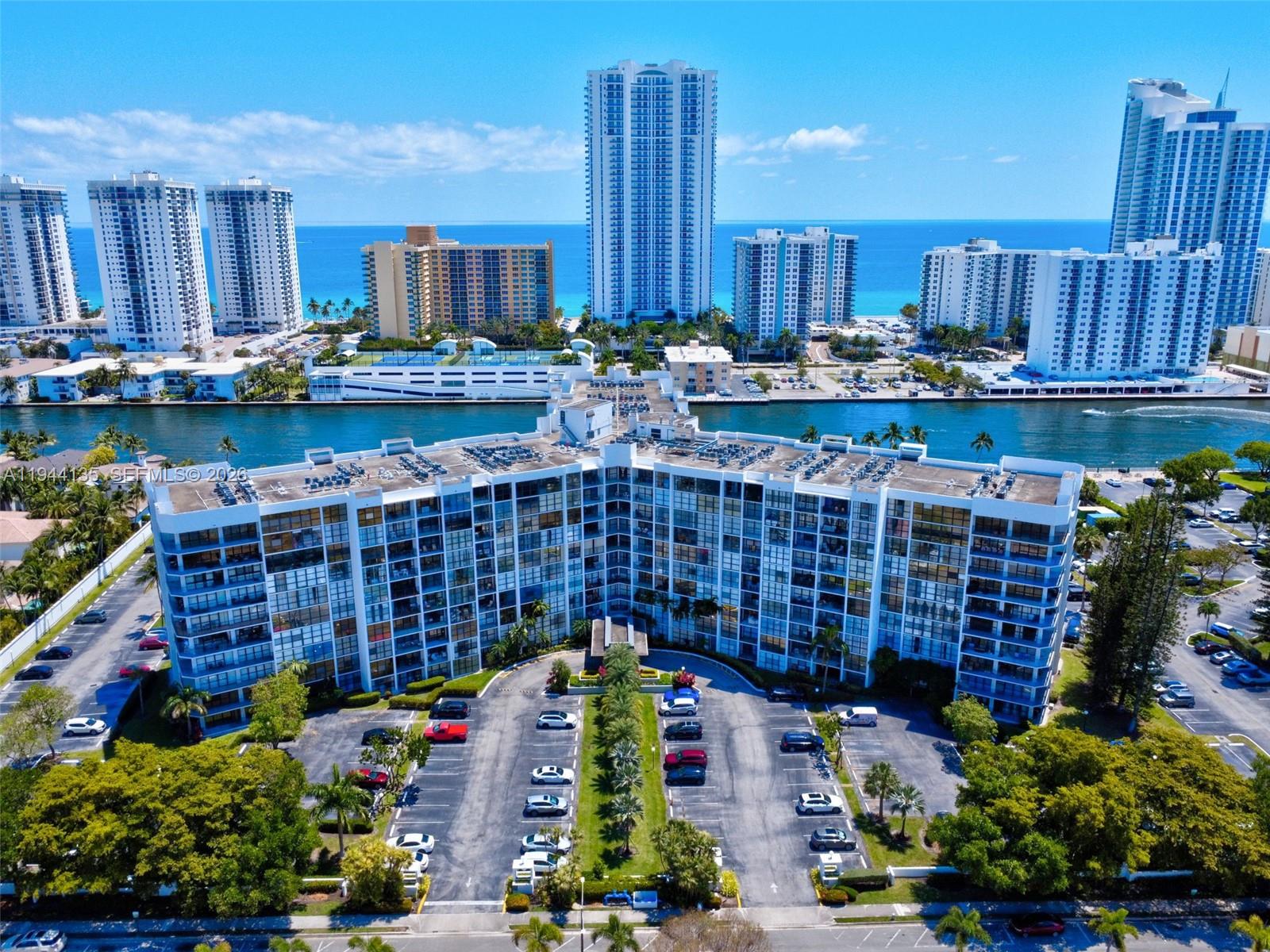 Magnificent corner unit 2-bedroom plus den featuring a wraparound open balcony with stunning intracoastal views. Fully furnished with porcelain flooring throughout the unit. Spacious master bedroom with a luxurious ensuite bathroom offering a double-door shower. internet and cable is included in the HOA maintenance .The building offers a heated waterfront pool perfect for watching boats go by, tennis court, gym, and 24-hour security with guard. Excellent location close to the ocean, Walmart, Gulfstream, grocery stores, and restaurants. 40-year inspection completed with no assessments.